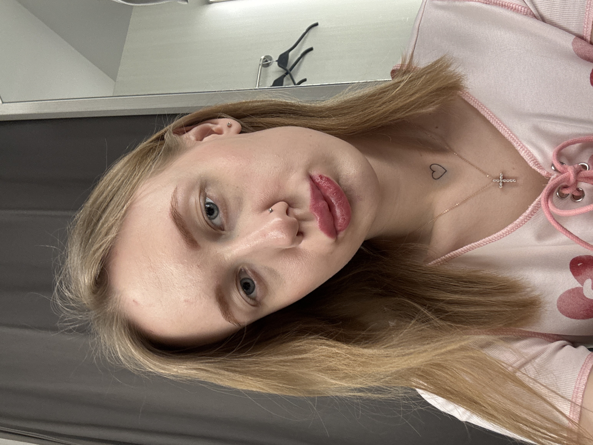 Woman takes fitting room selfies while shopping in Russia