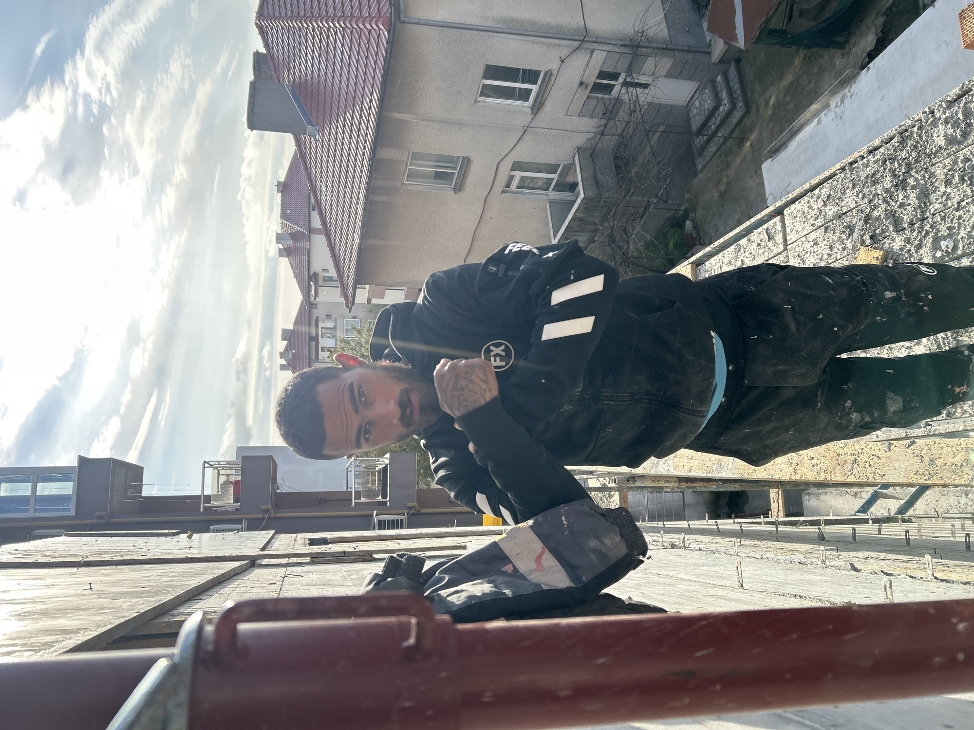 Man on scaffolding observed in Tsarevo, Bulgaria morning hours