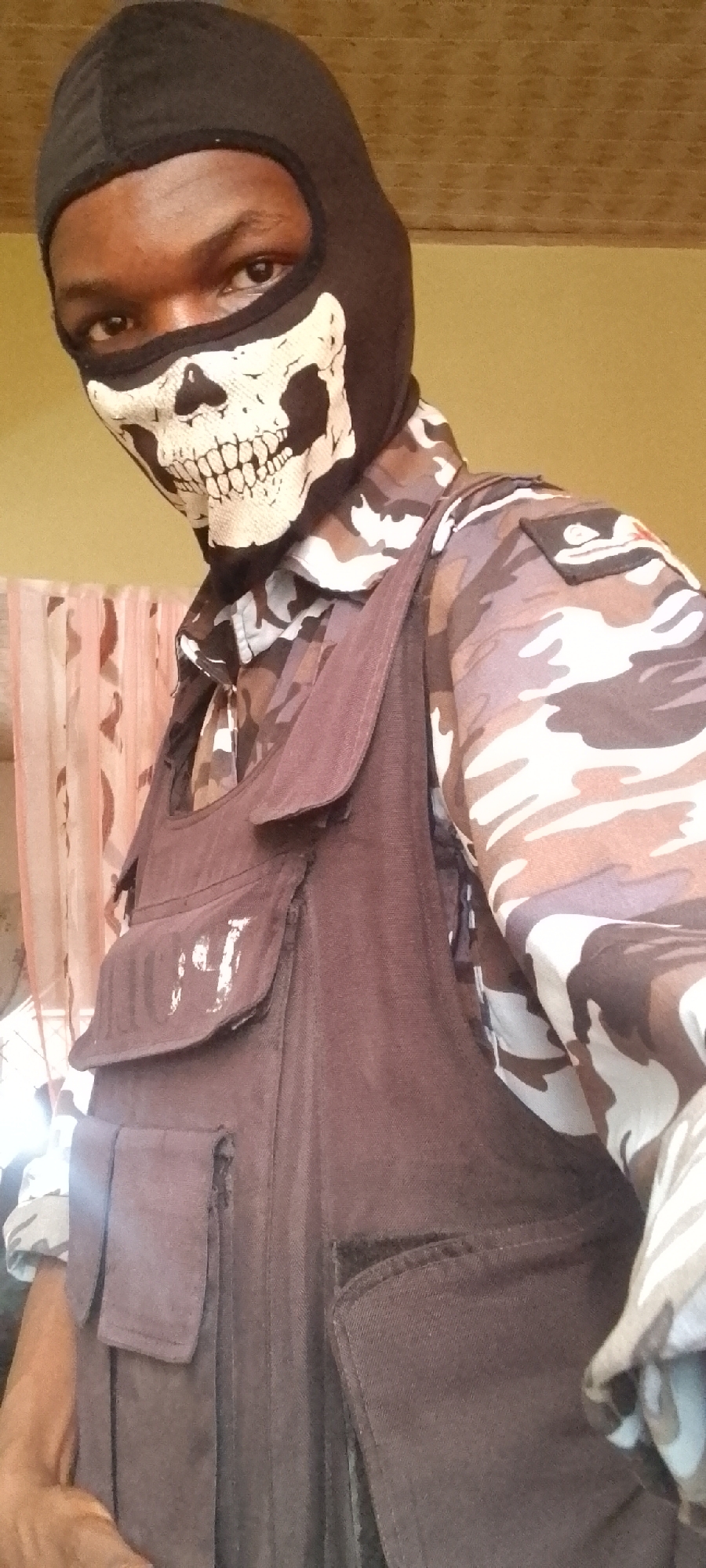 Masked individual in tactical gear observed at undisclosed location