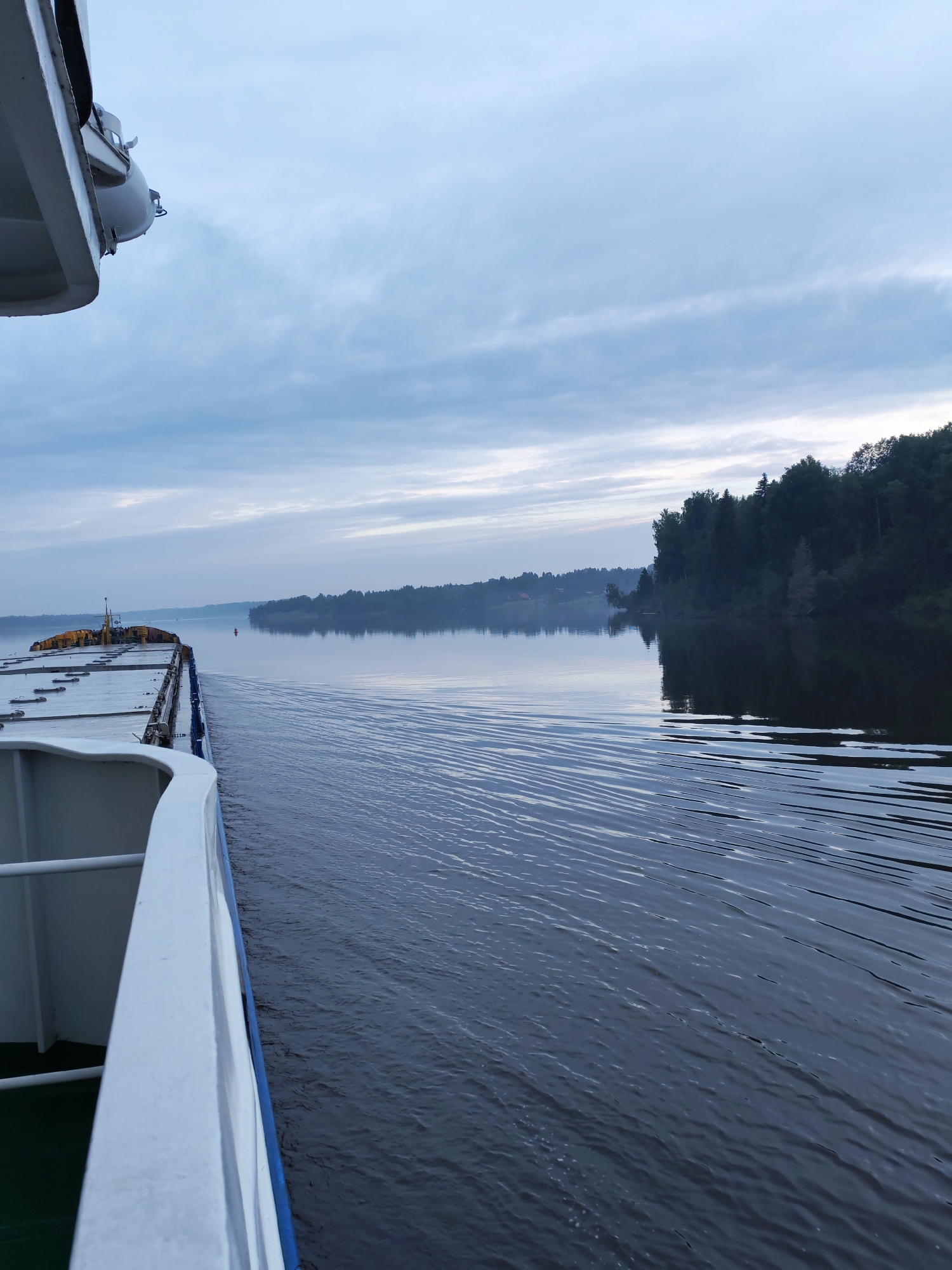 Evening ferry ride through the rivers near Kondratovo, Russia