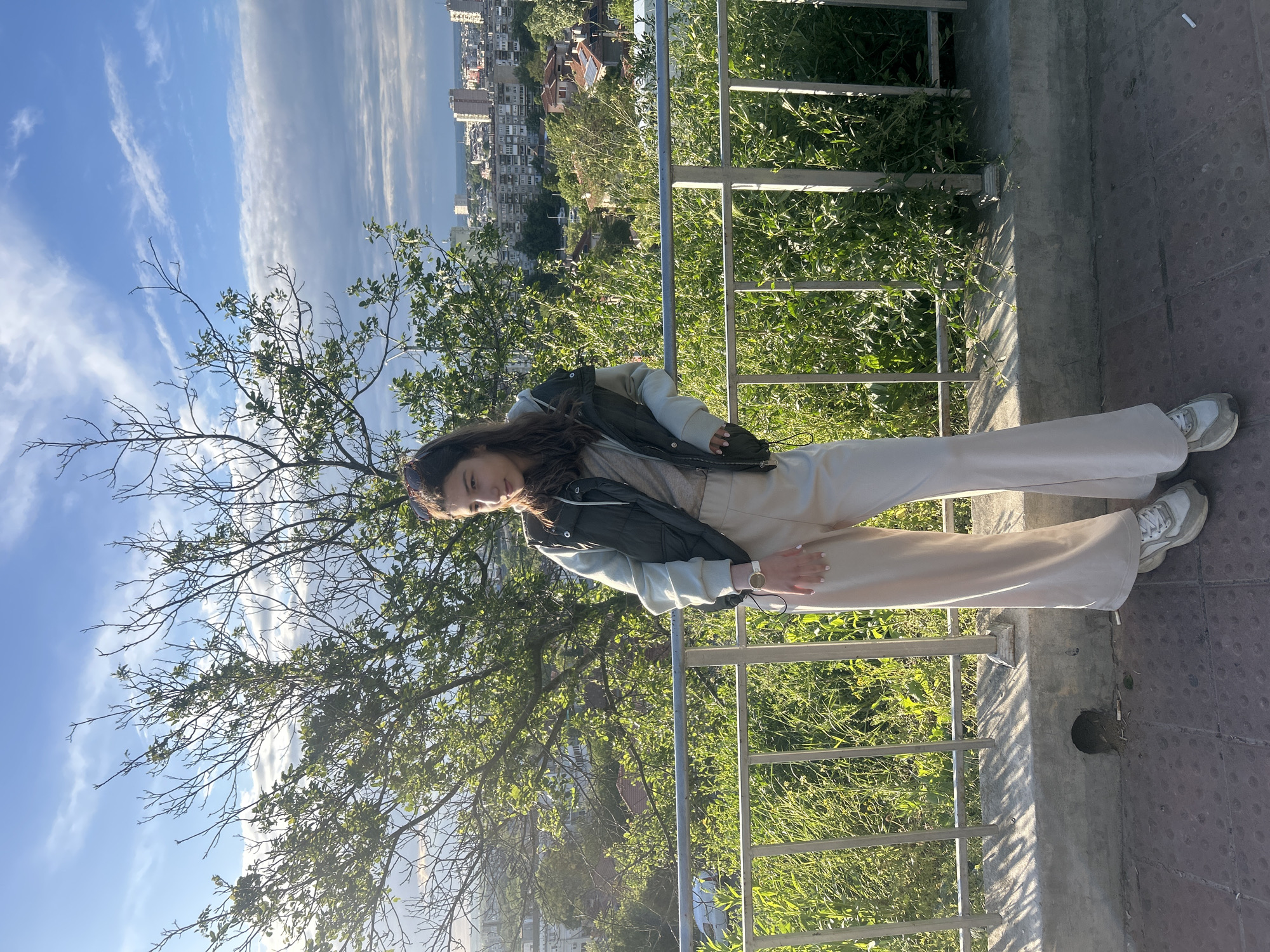 Women film social media content overlooking Ruse, Bulgaria