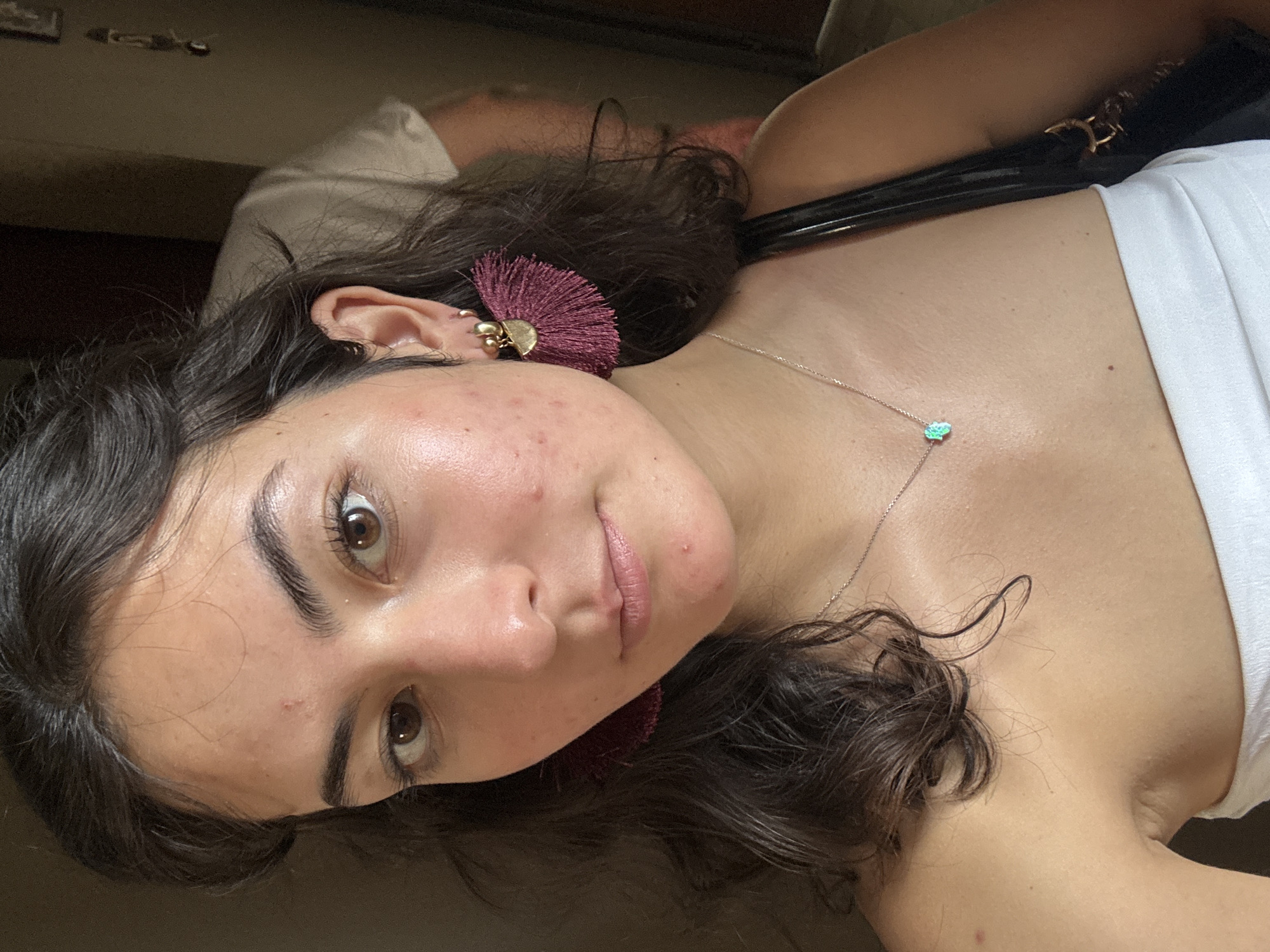 Woman photographed with keys, bag in Puebla hallway