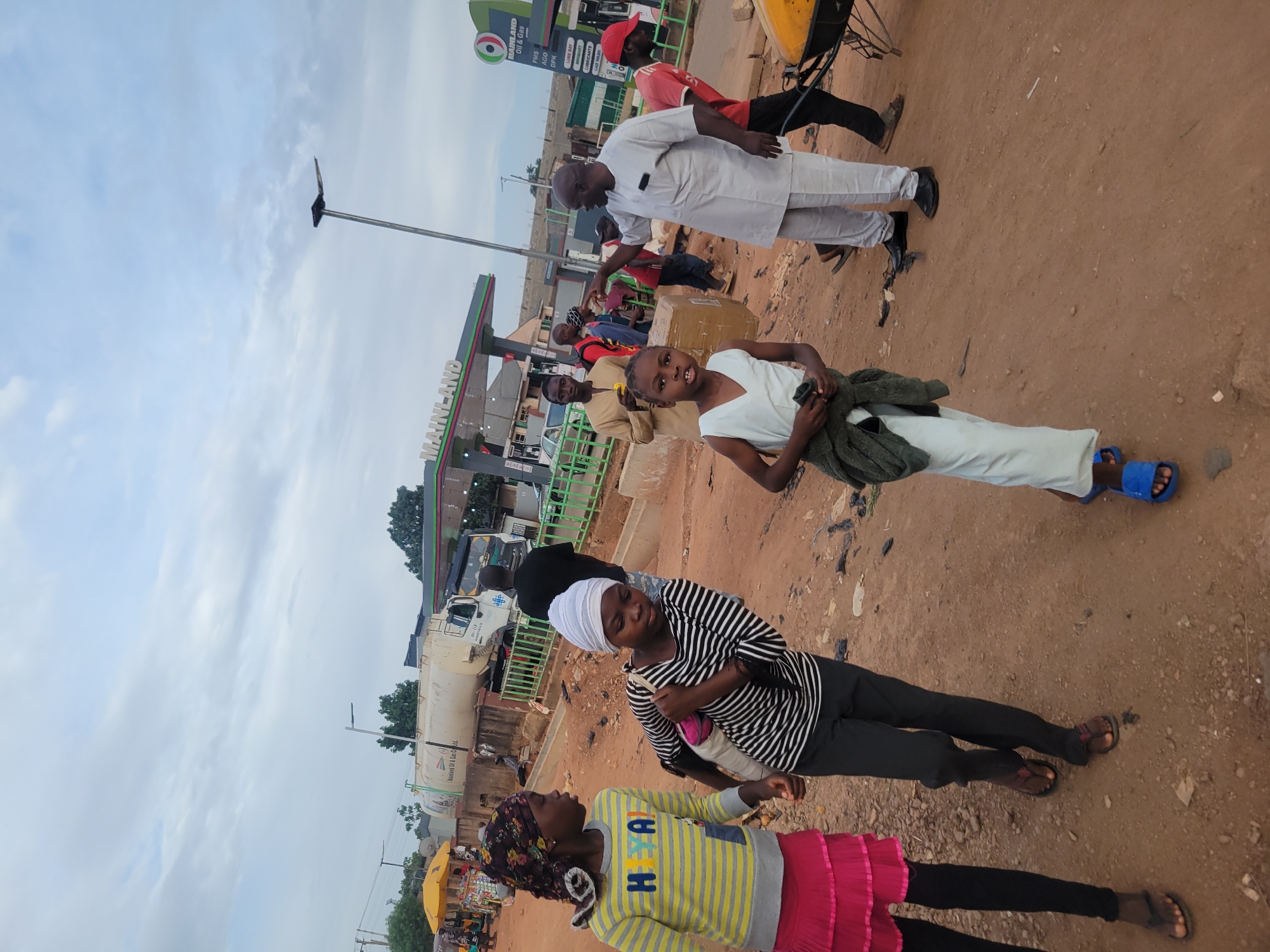 Afternoon market activity documented in Jos, Nigeria streets