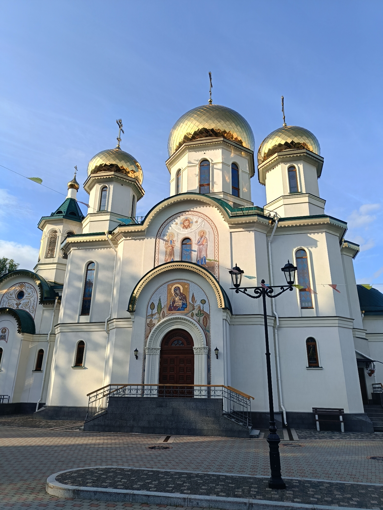 Orthodox church and garden roses, explored up close