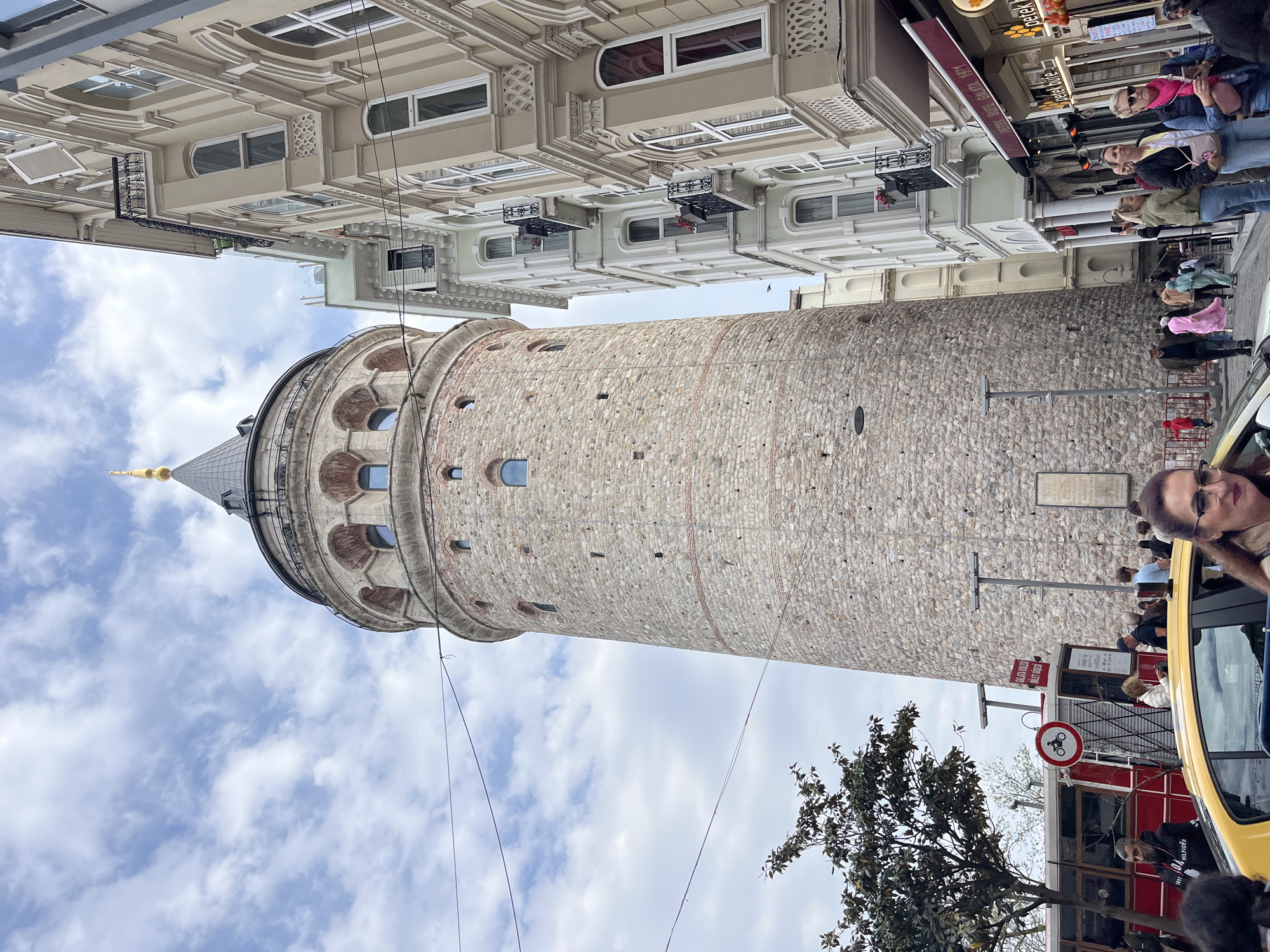 Tourists gather around historic Galata Tower in Istanbul's Beyoğlu district