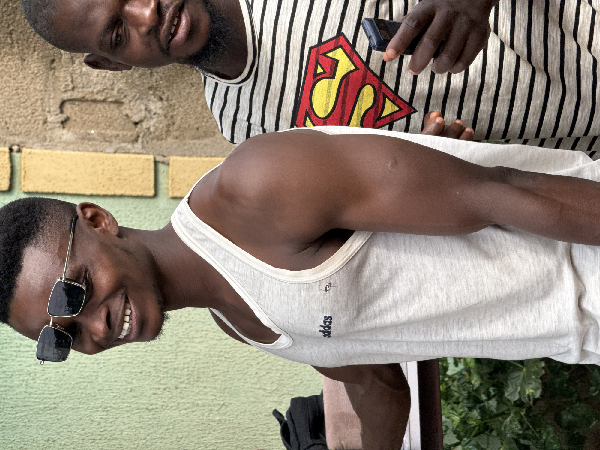 Casual hangout at a makeshift outdoor gym in Akwanga