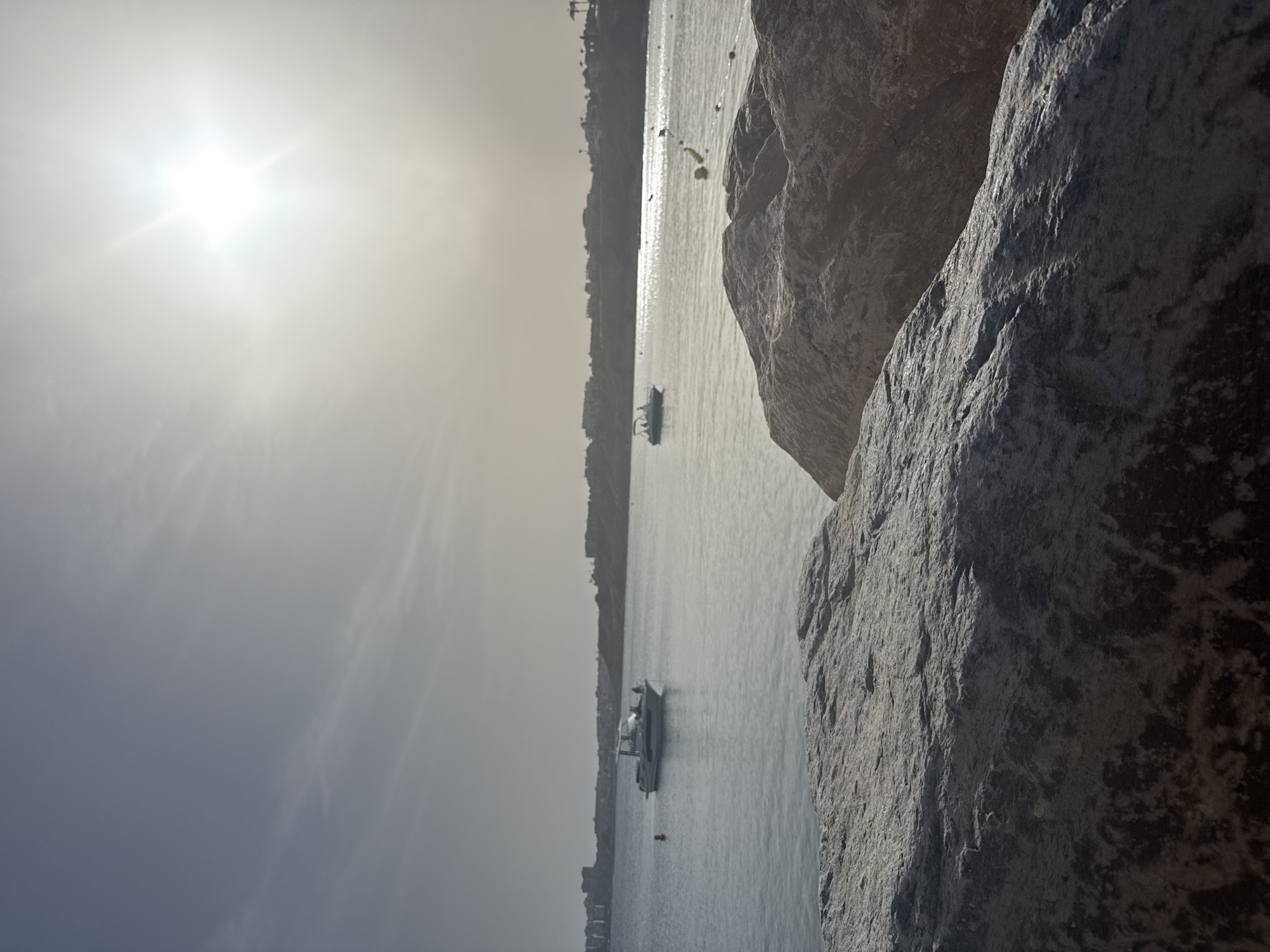 Afternoon at the marina: boats, coastline, and casual seaside wandering