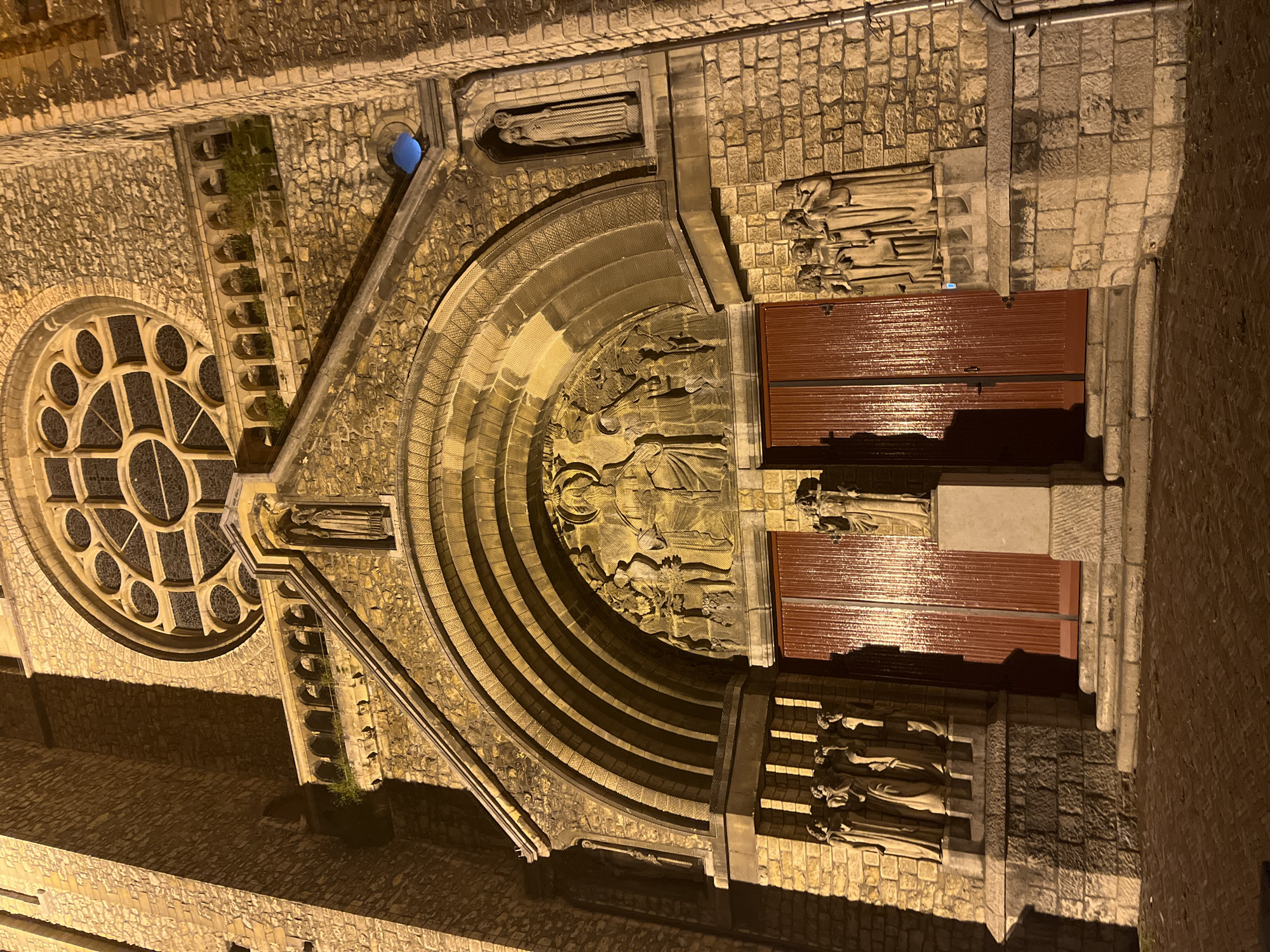 Basilica of Our Lady illuminated at night in Maastricht