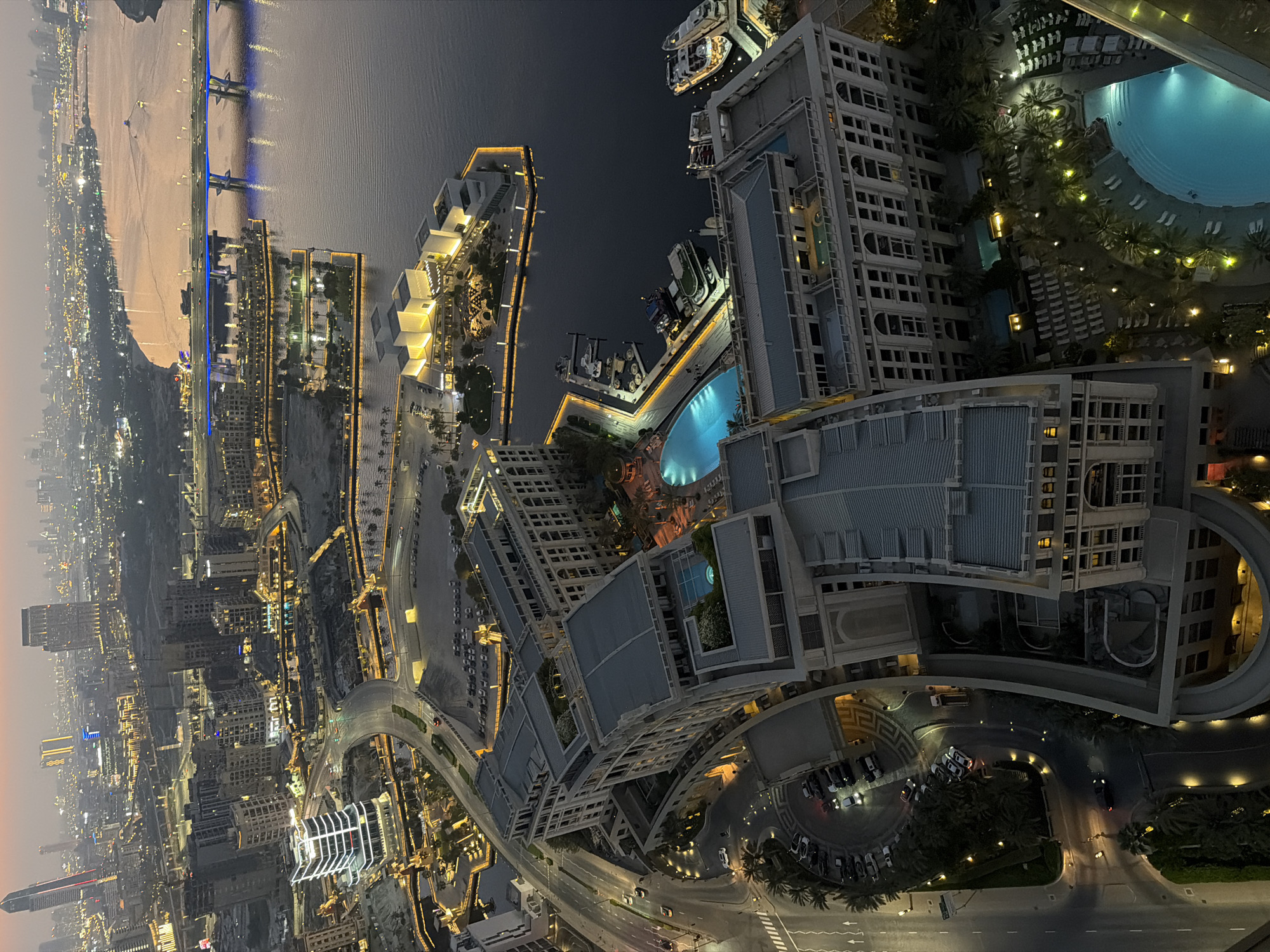 Dubai skyline from dusk to night, seen from above