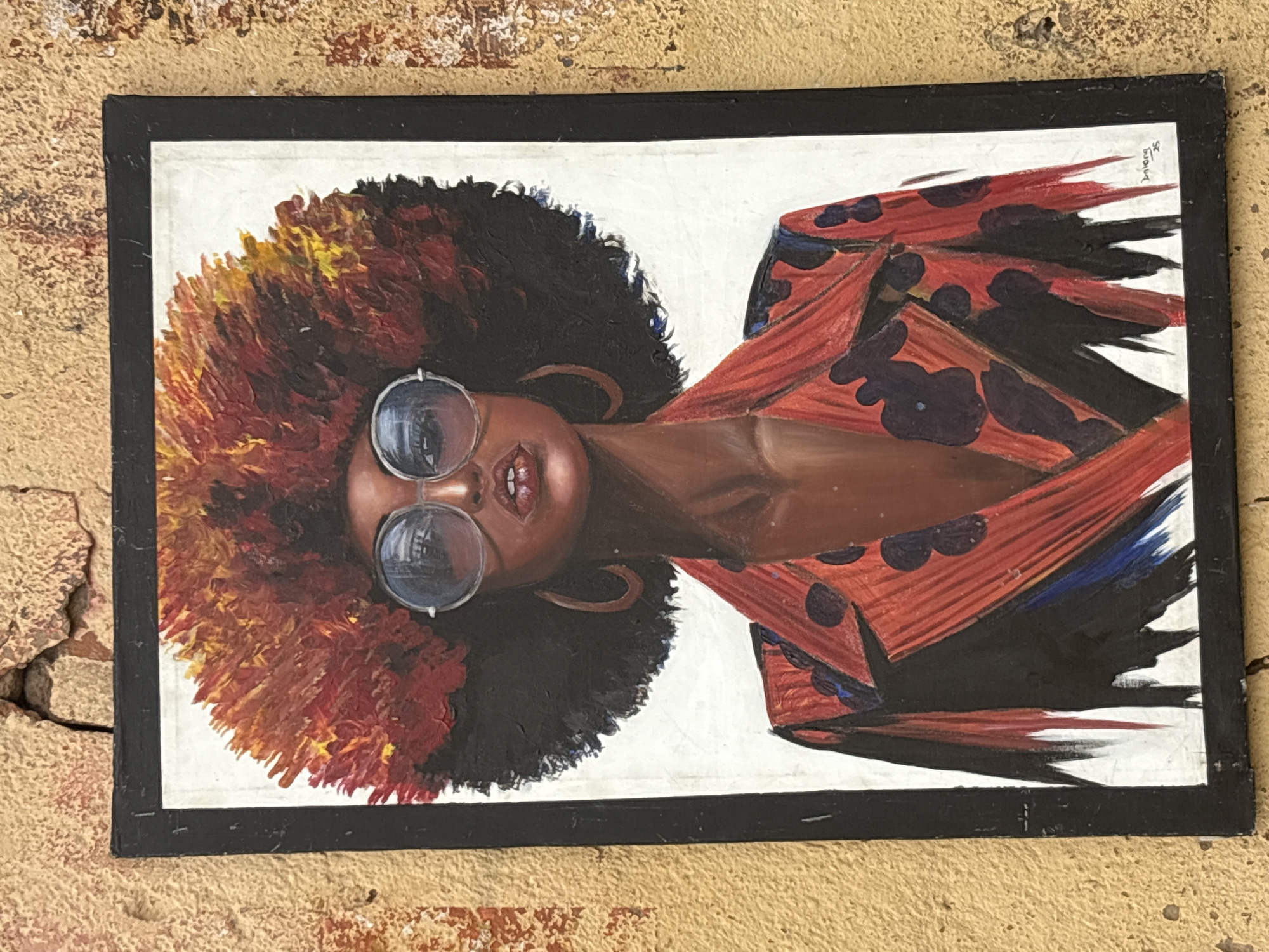 African-themed art collection displayed on walls in Lafia, Nigeria