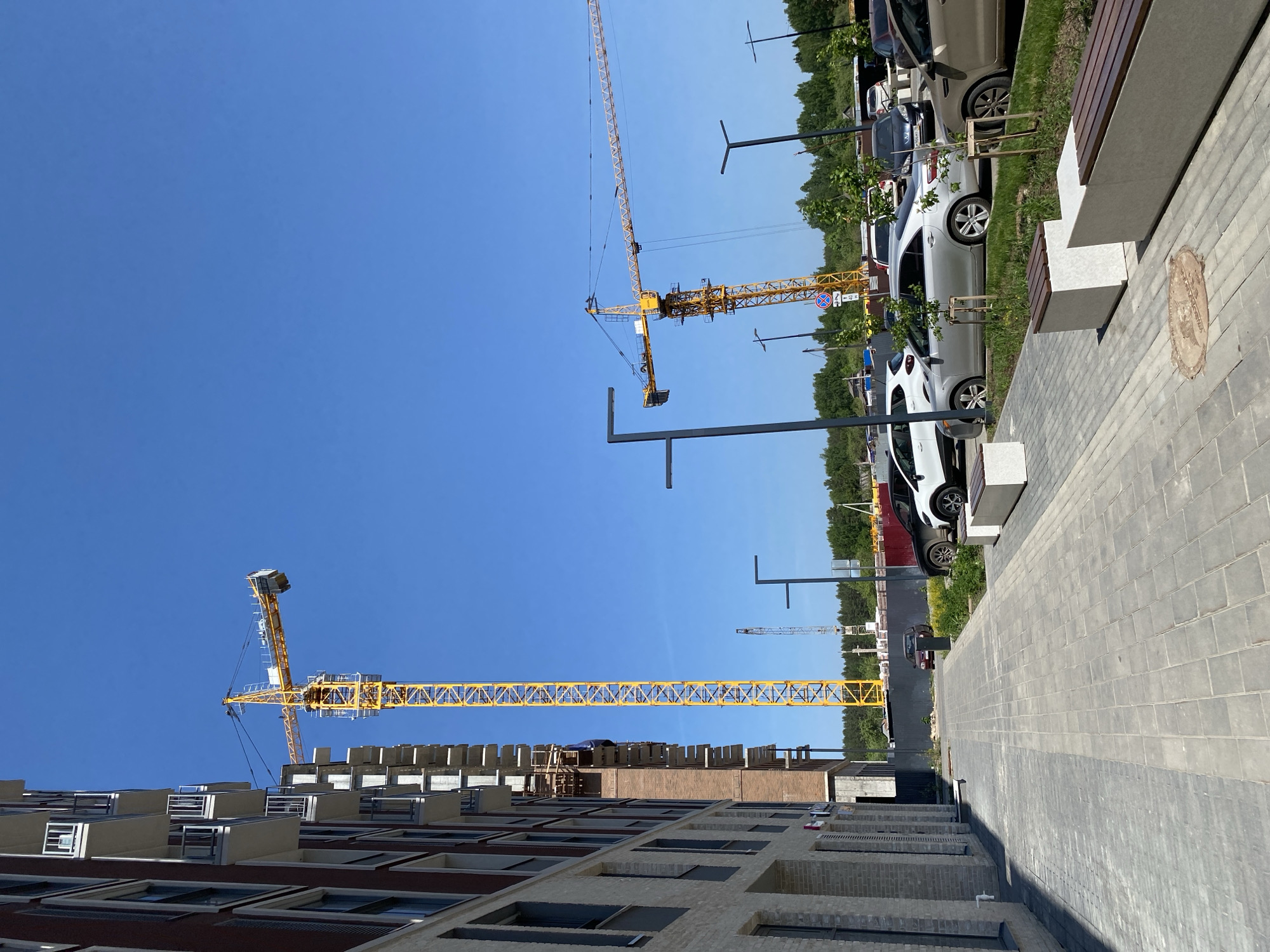 Construction activity documented in Izhevsk with yellow cranes