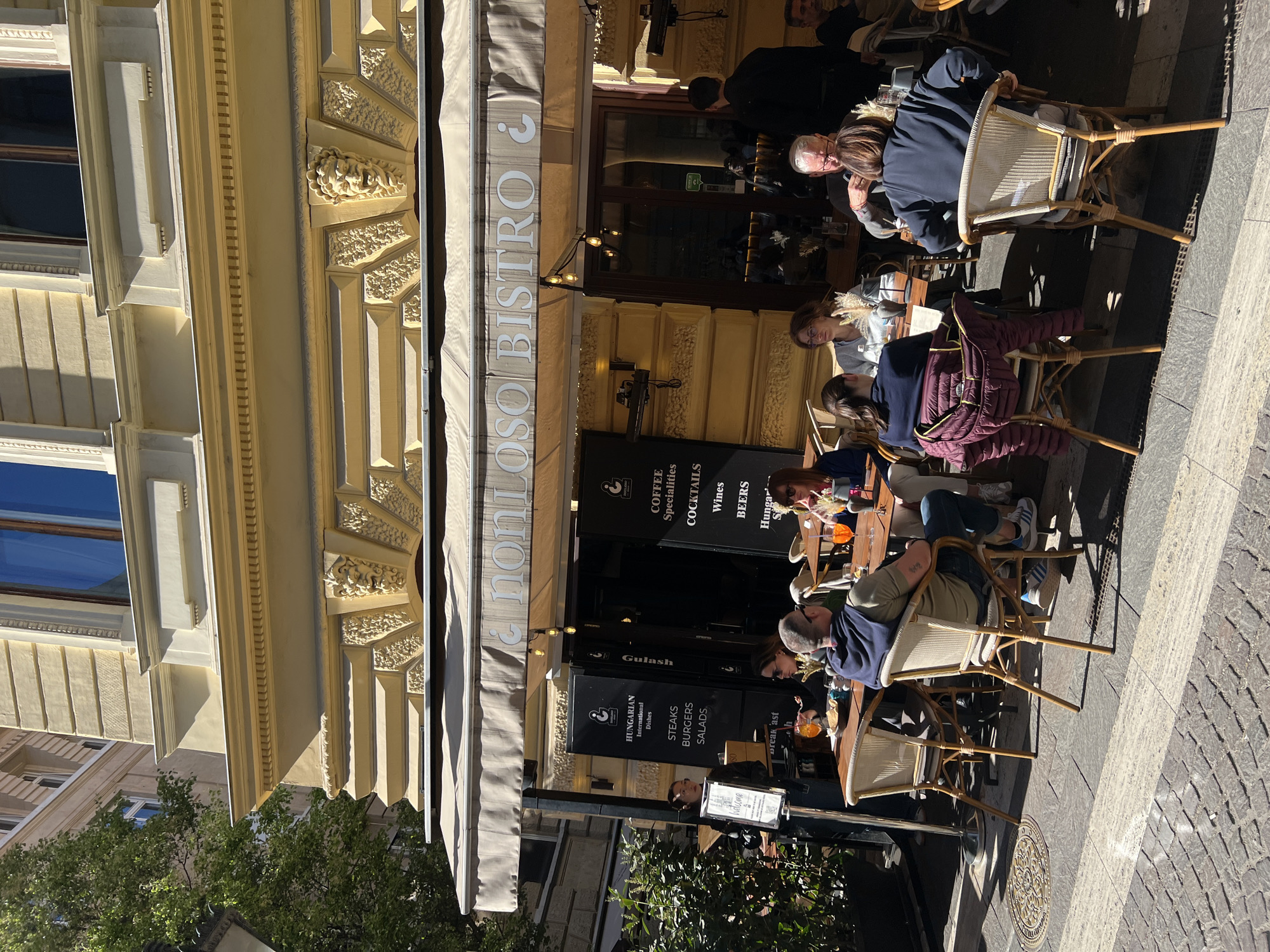 Sunny afternoon brings crowds to Budapest cafes near St. Stephen's