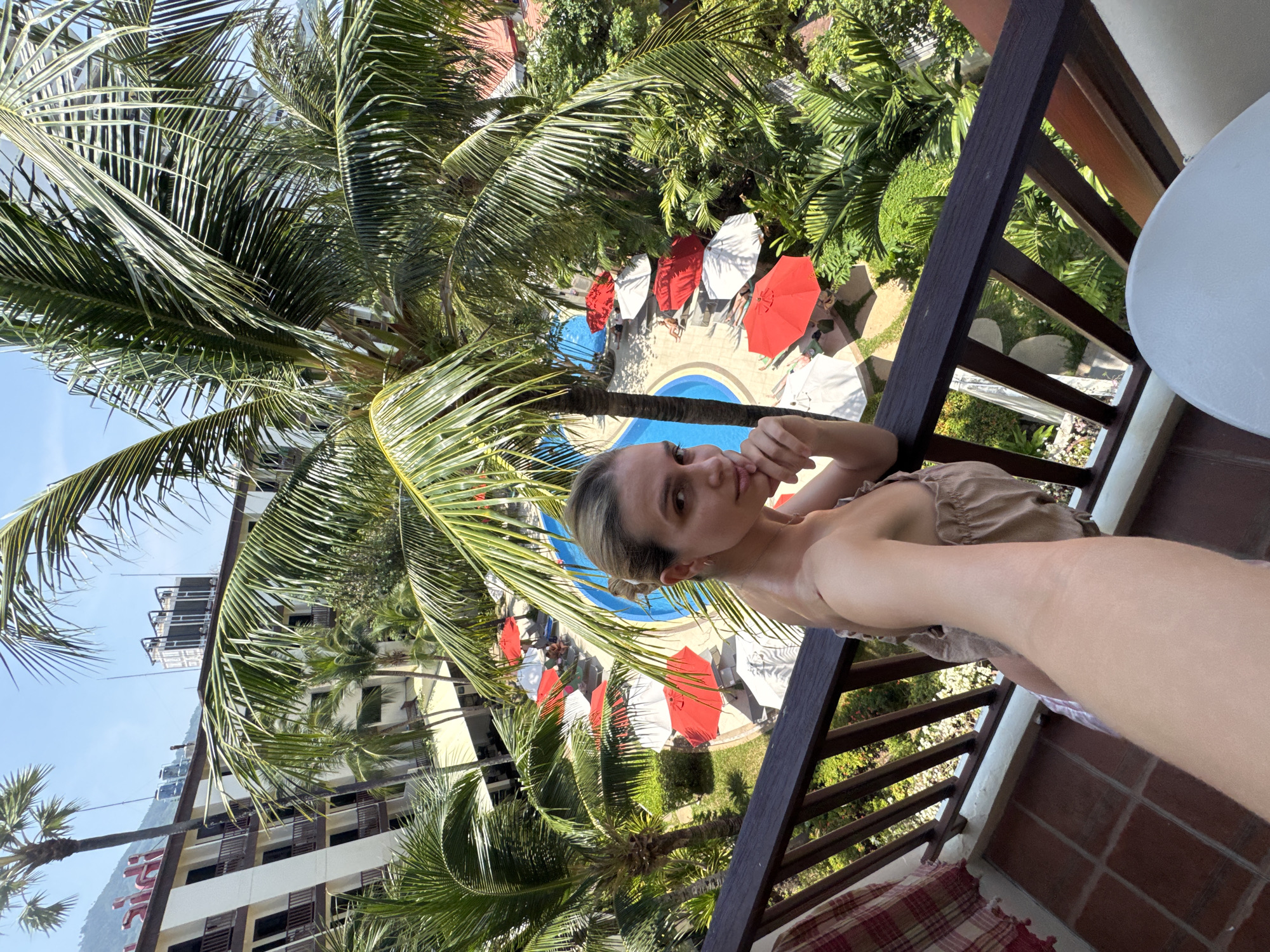 Resort pool scene captured from balcony in Patong Thailand