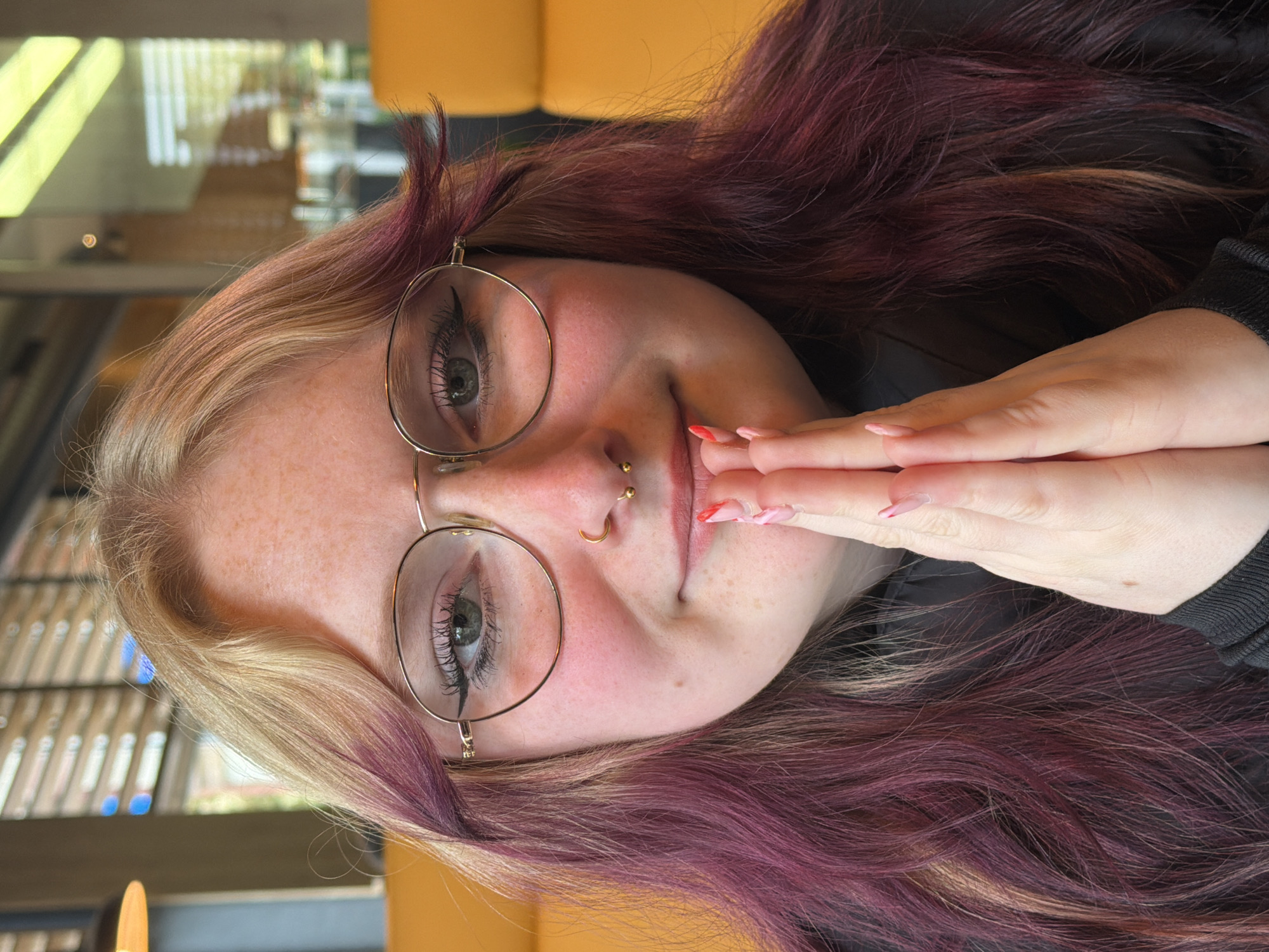 Young women share casual restaurant moment in Grevenmacher