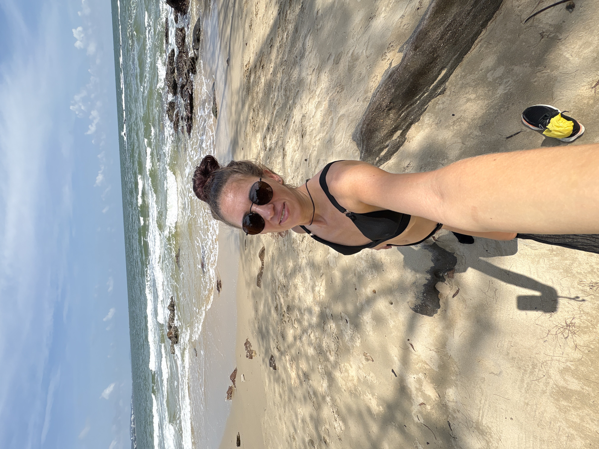 Laid-back beach morning with selfies, a book, and ocean views
