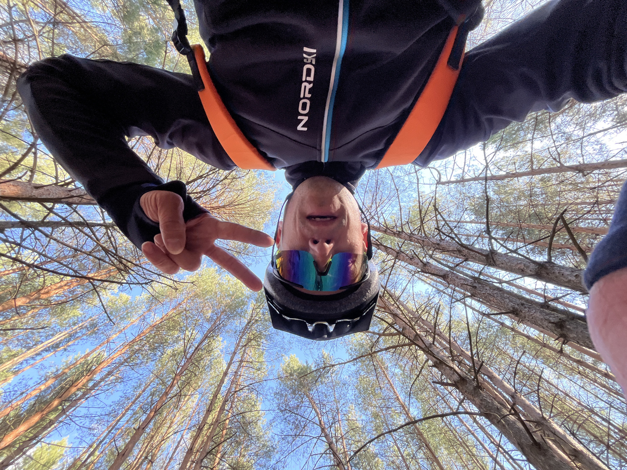 Cyclist flashes peace sign in Chaikovsky, Russia