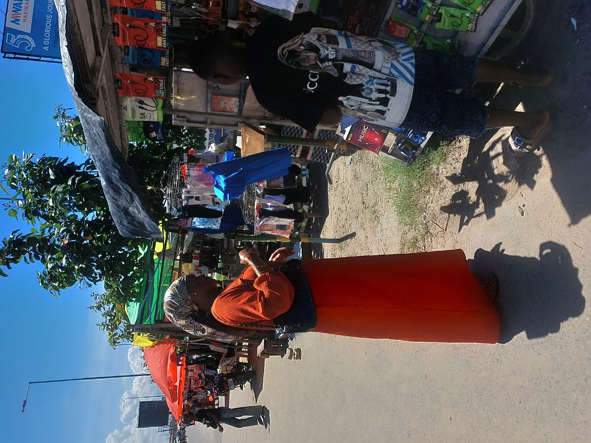 Morning street life documented across Dar es-Salaam neighborhoods
