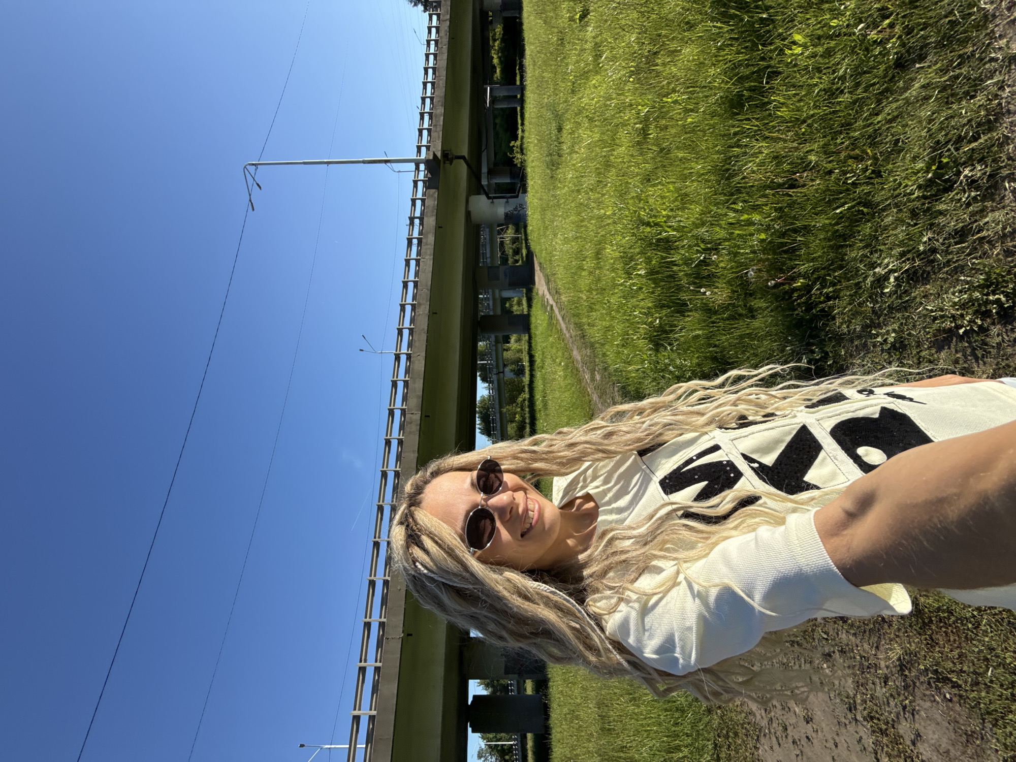 Woman takes outdoor selfie in Шебунино, Russia
