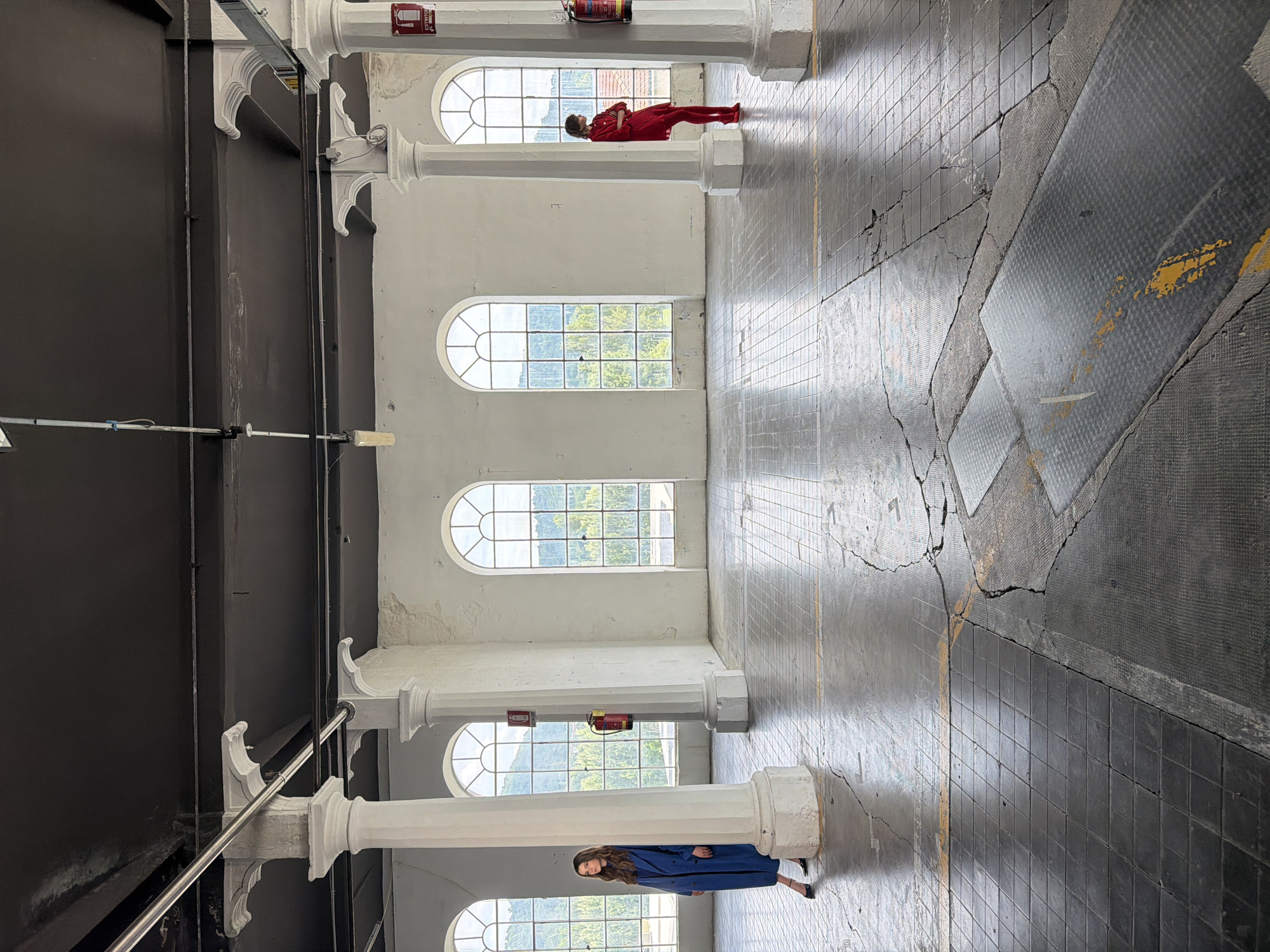 Professional photoshoot documented in converted warehouse, Alzano Lombardo