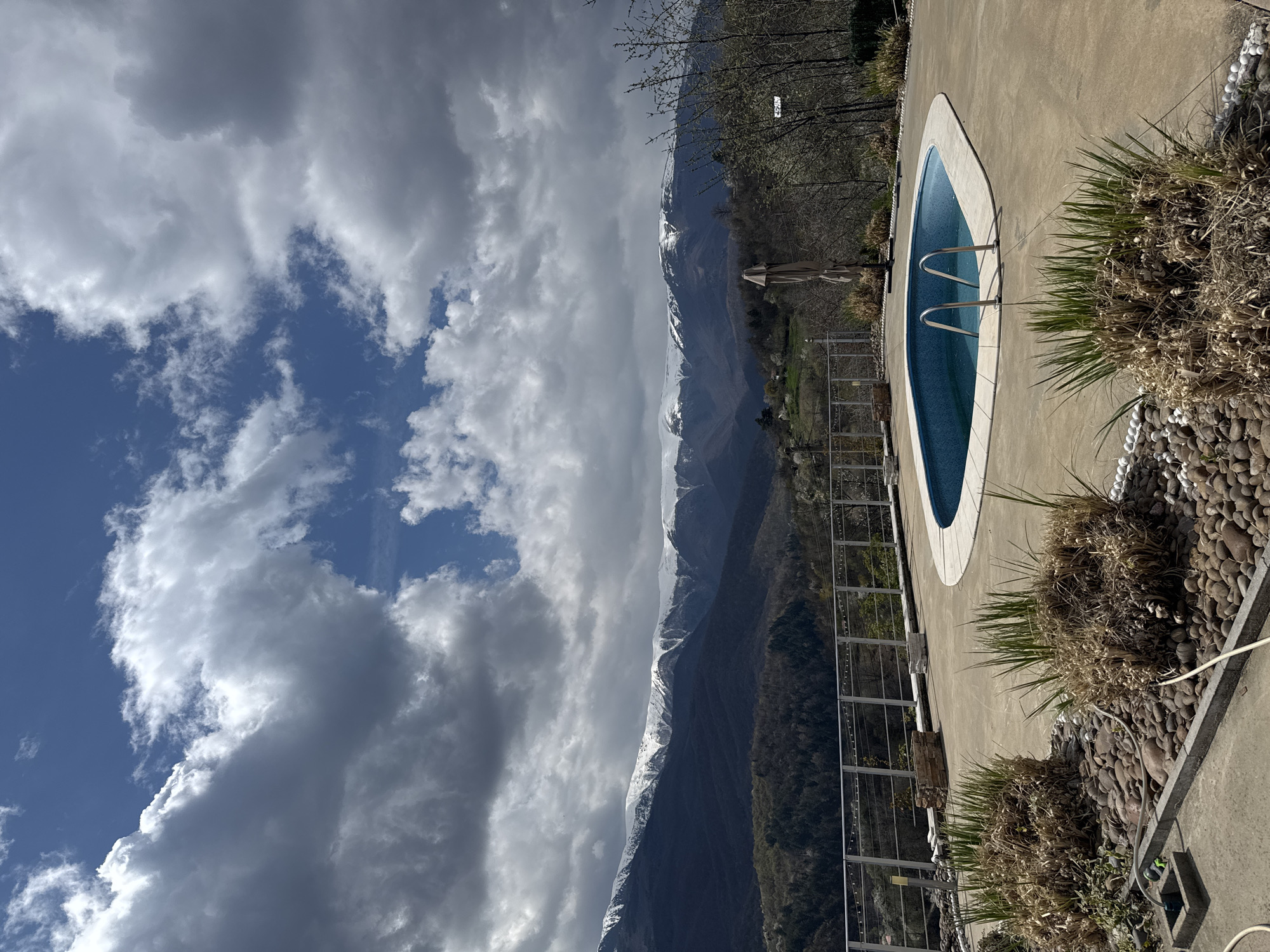 Private pool documented against mountain backdrop in Berkovitsa, Bulgaria