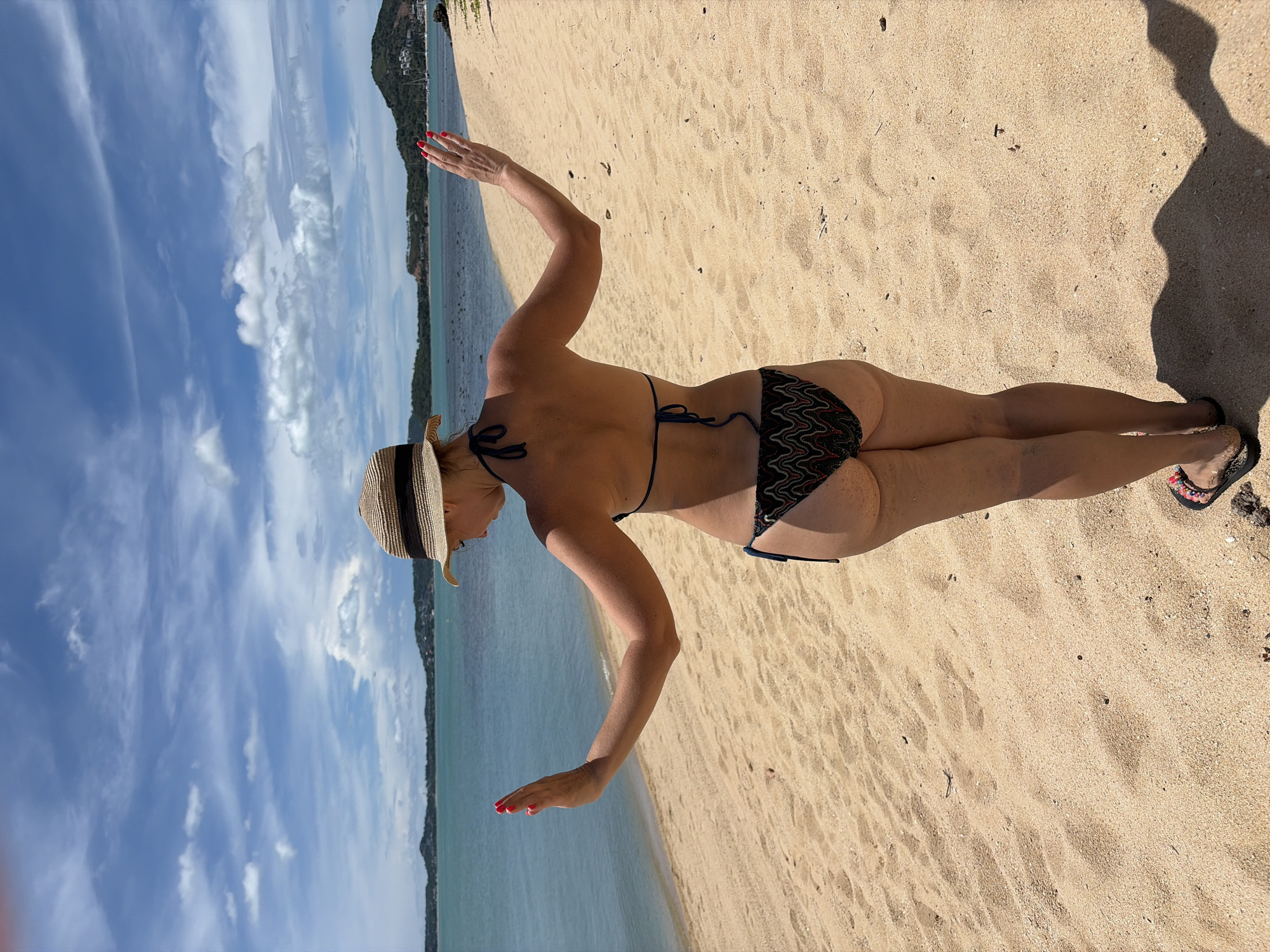 Lazy beach morning at Baan Bo Phut — sand, shallows, and floating