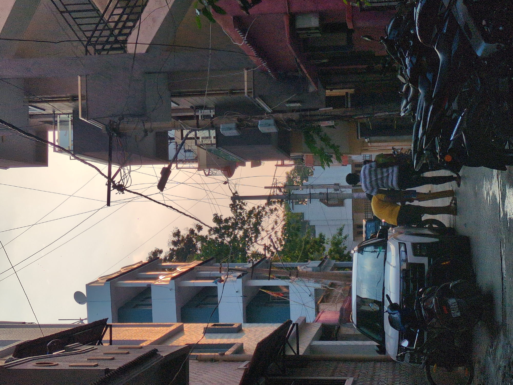 Bengaluru street scenes captured during midday golden hour