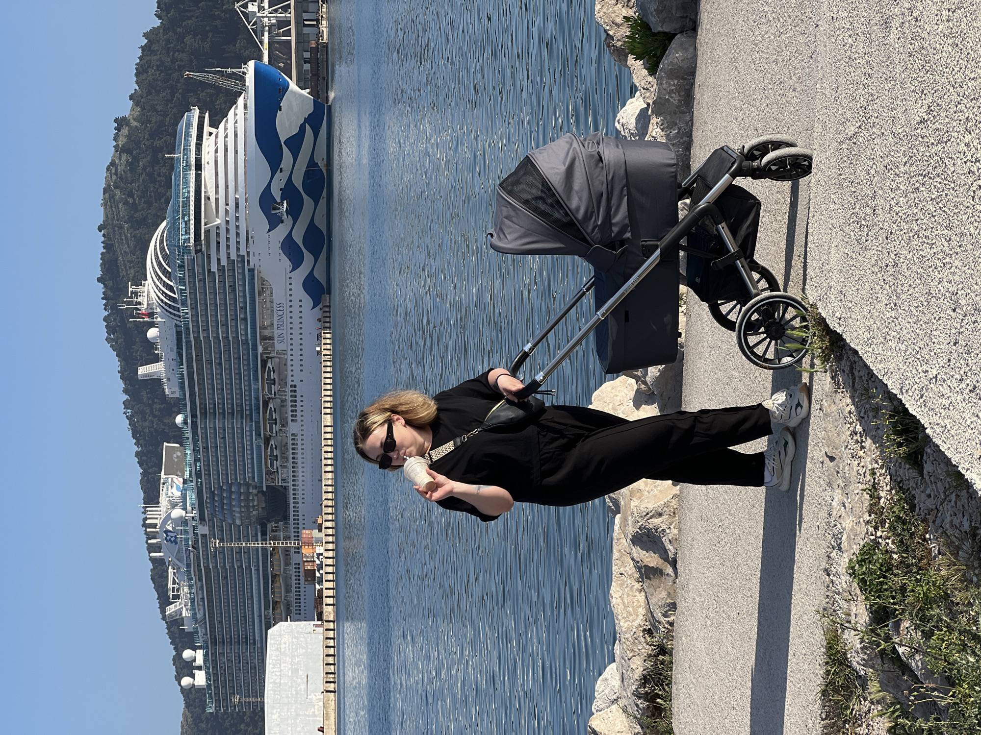 Woman with stroller spotted near cruise ship in Bar, Montenegro