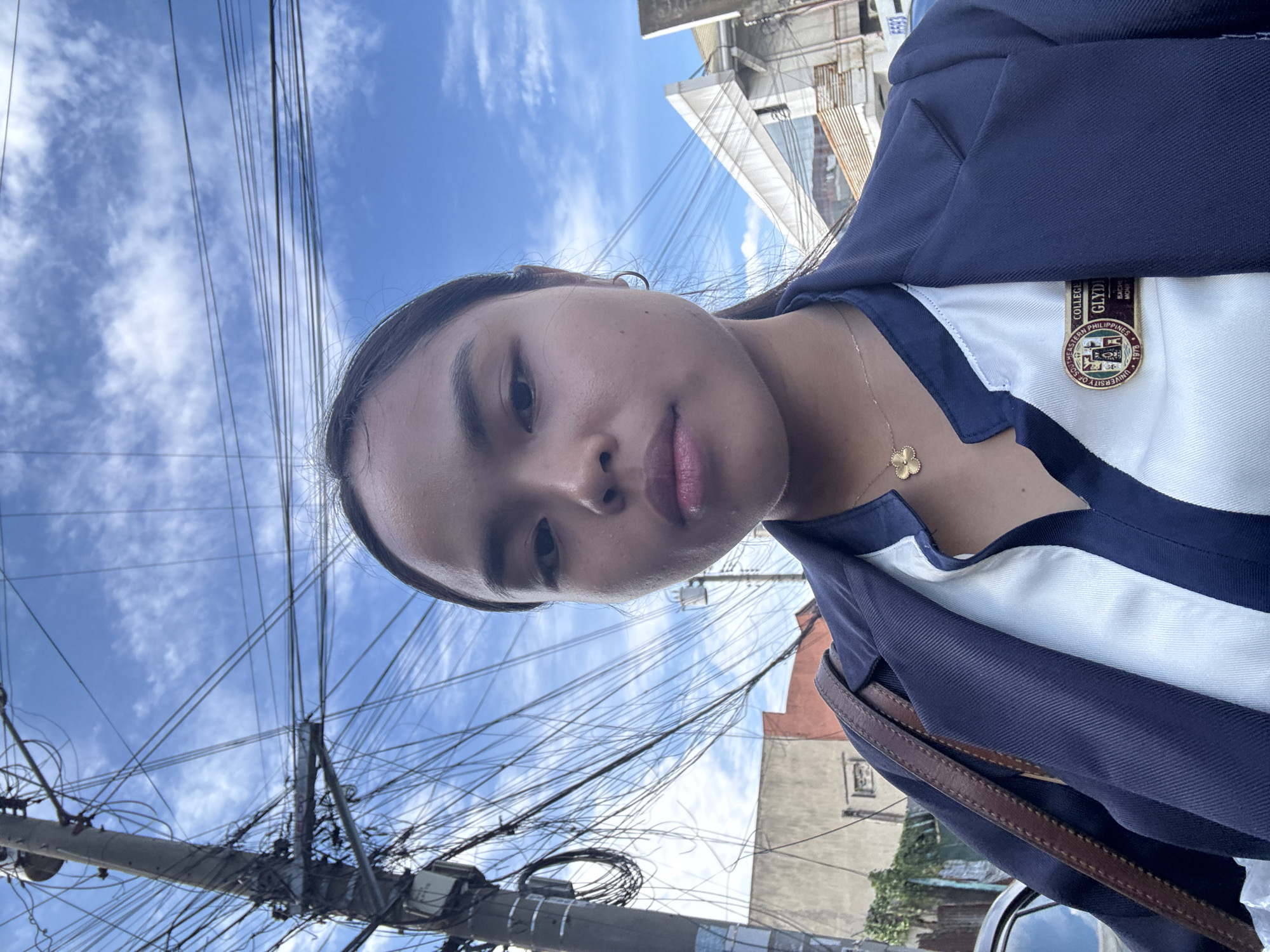 Navy blazer, urban Davao — two angles, seconds apart