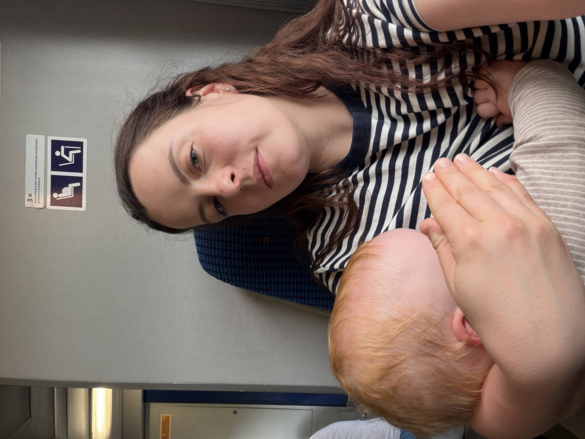 Mother and baby travel by train in Czech Republic