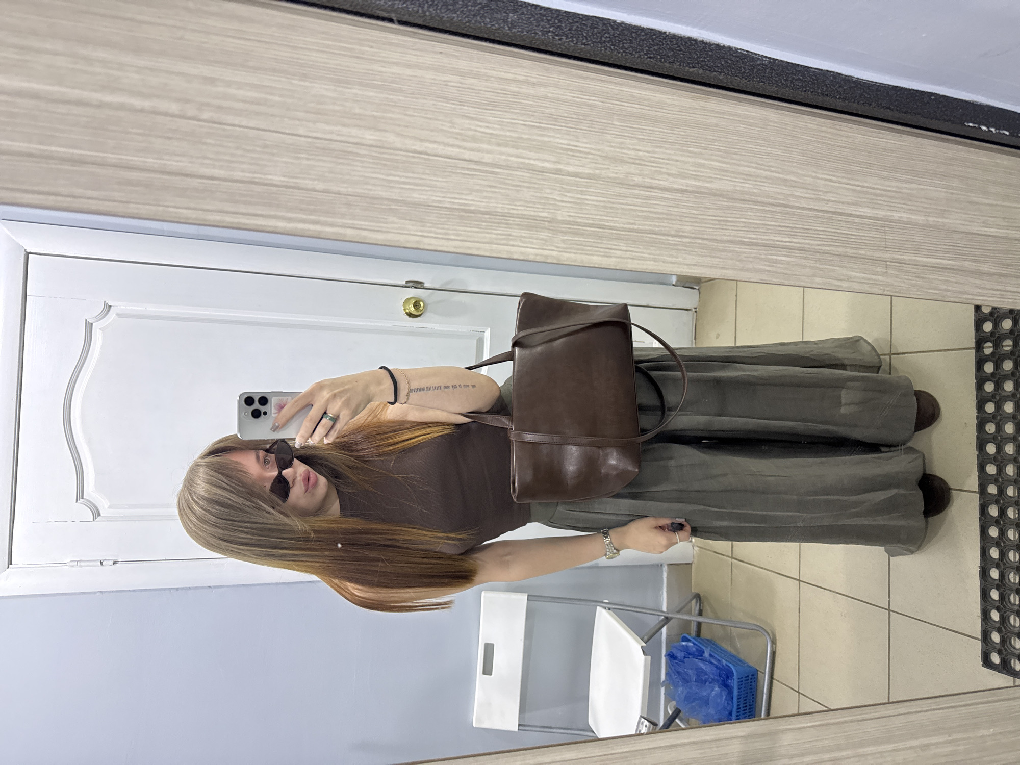 Woman takes selfies in Chaikovsky salon, neglected area documented