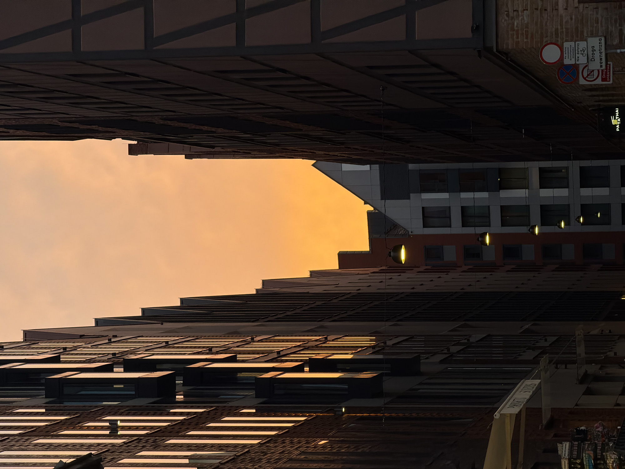 Evening scenes captured in Gdańsk showing architecture and docked ship
