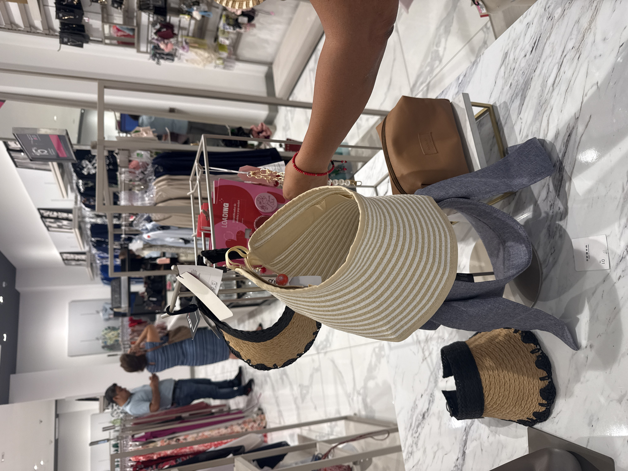 Shoppers browse clothing store in Acapulco