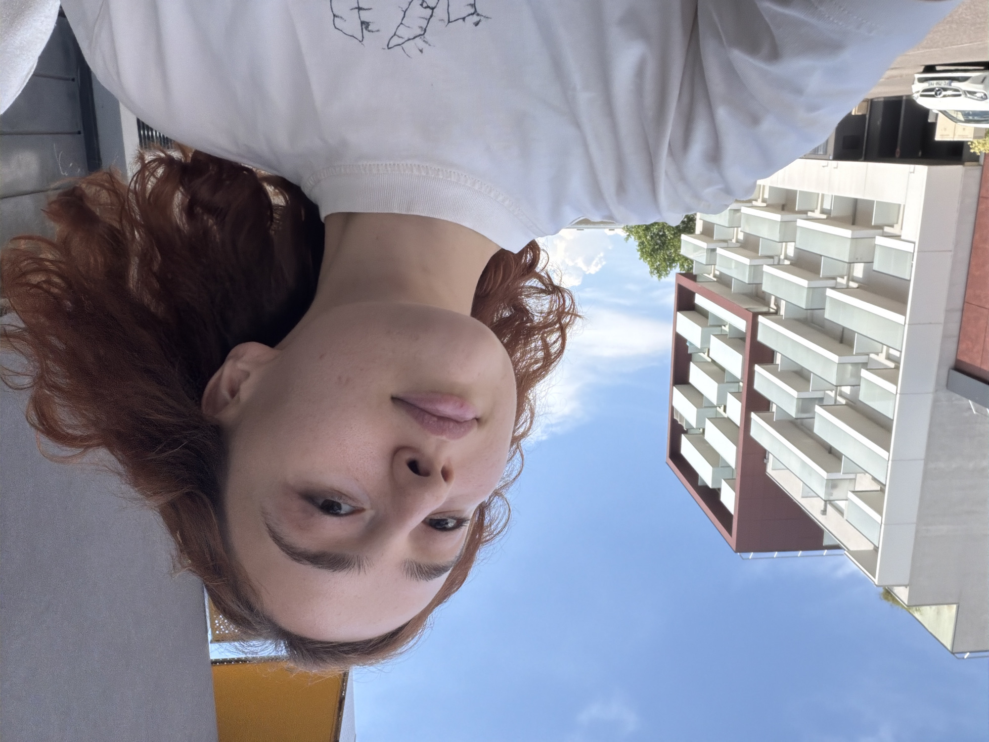 Casual selfie session around a Strasbourg neighborhood on a sunny afternoon