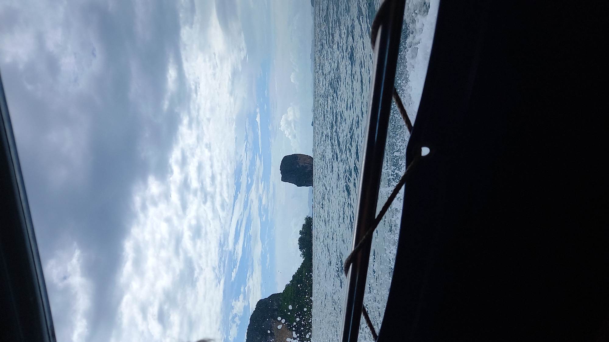 Boat journey captured in choppy waters off Ao Nang