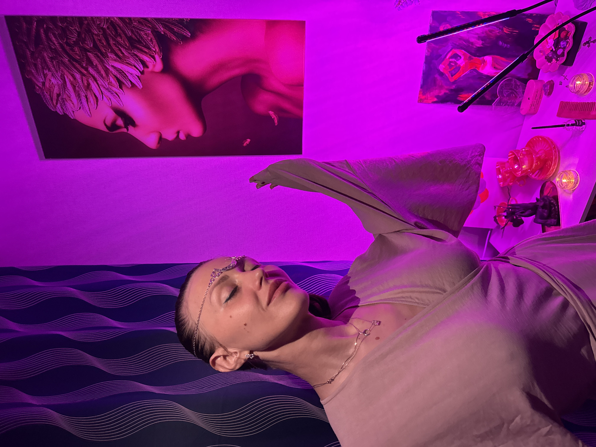Woman photographed in bedroom and kitchen during evening hours