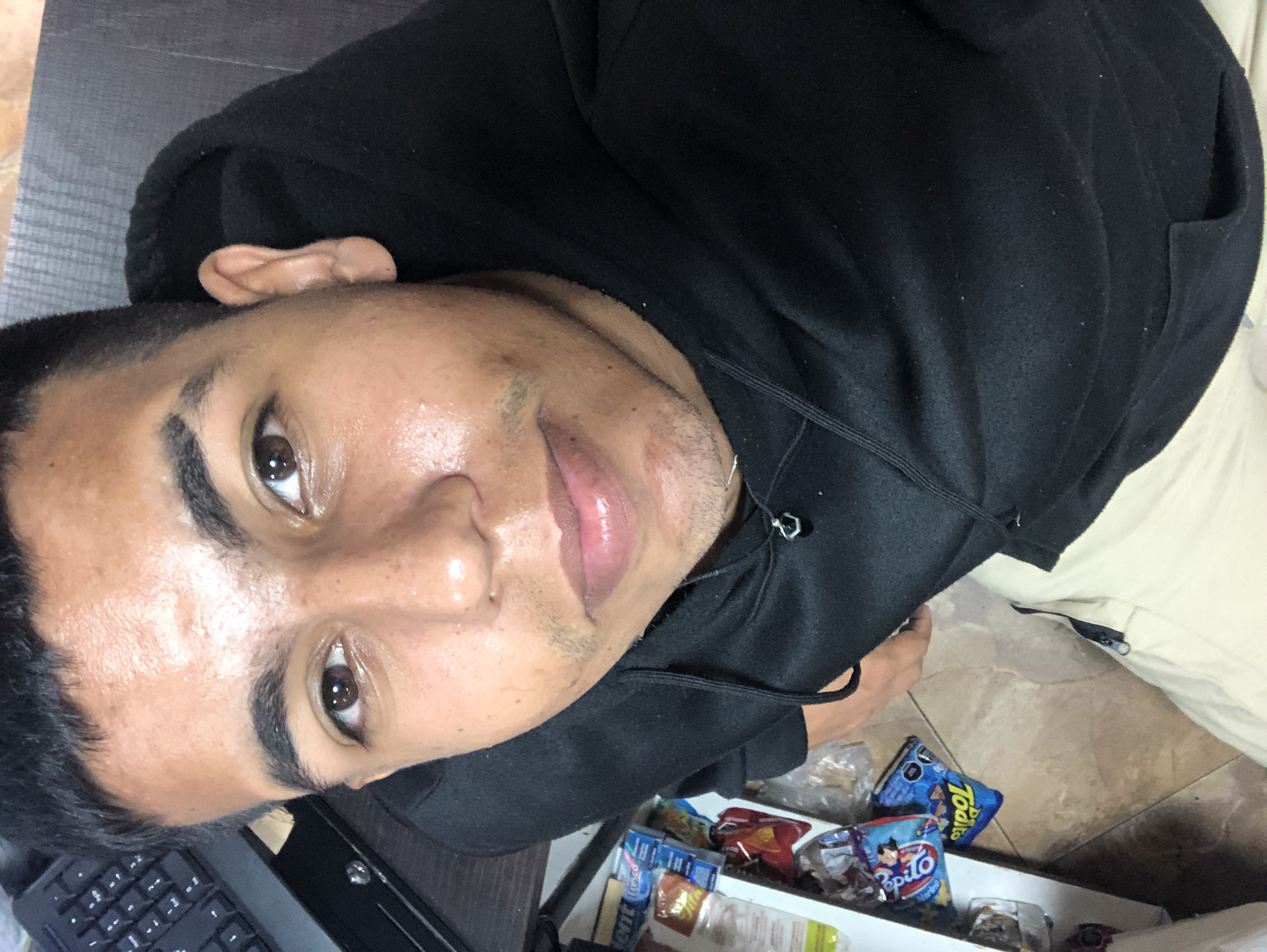 Young man photographed indoors in Juan Griego, Venezuela