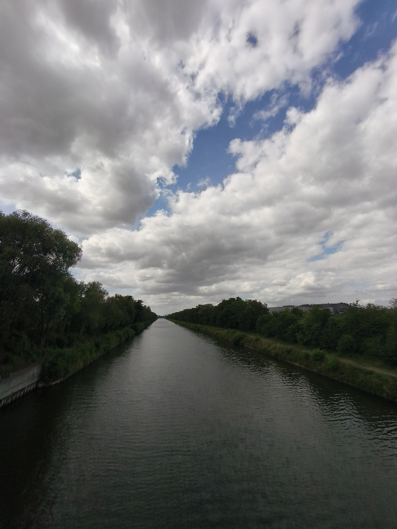 Canal views along the waterway in Dourges, France