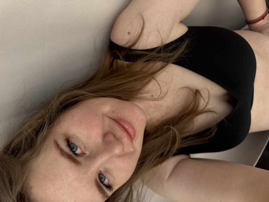 Woman captures self-portraits in bedroom in Gornyi, Russia