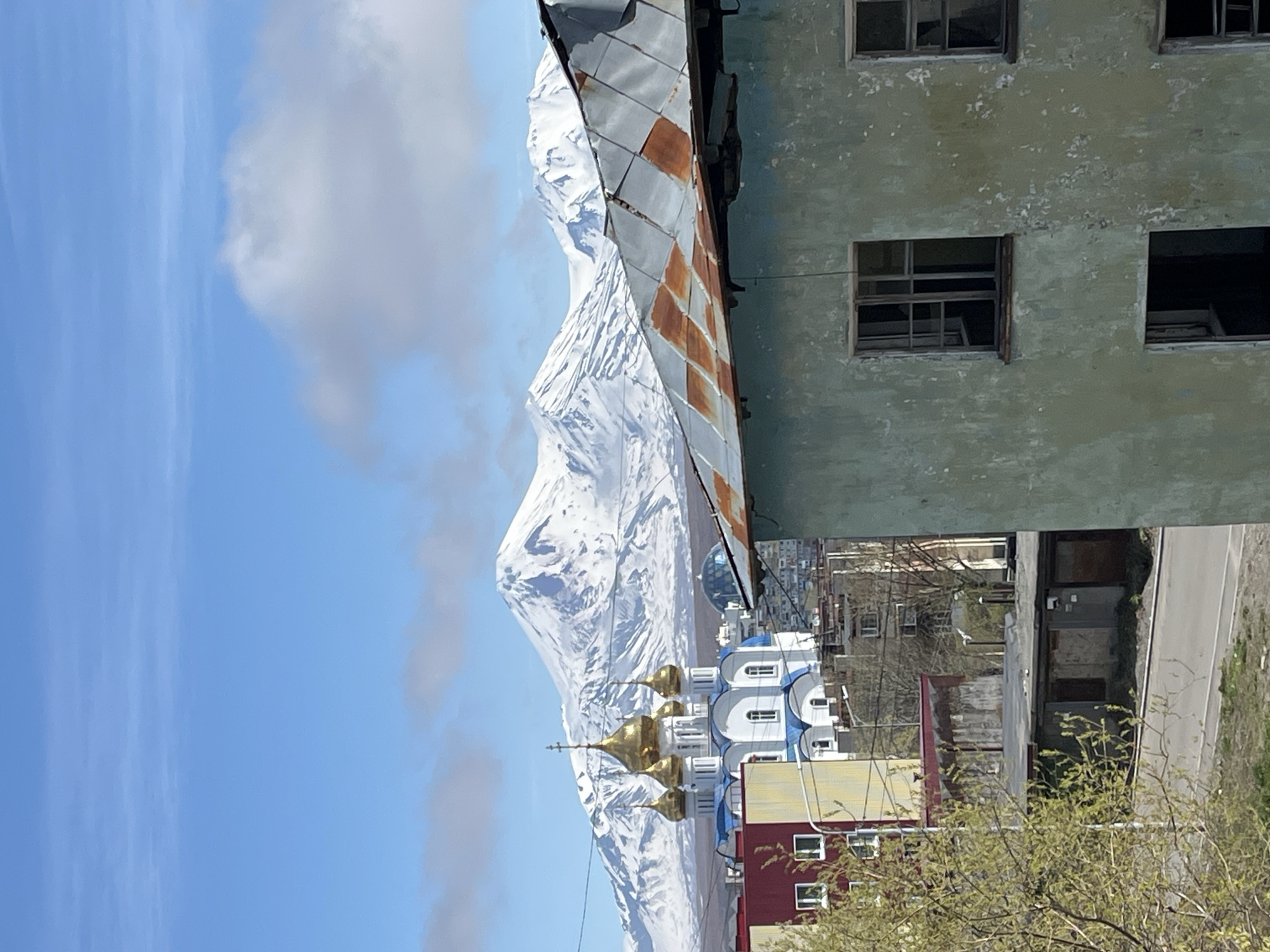 Orthodox church amid urban decay captured in Kamchatka