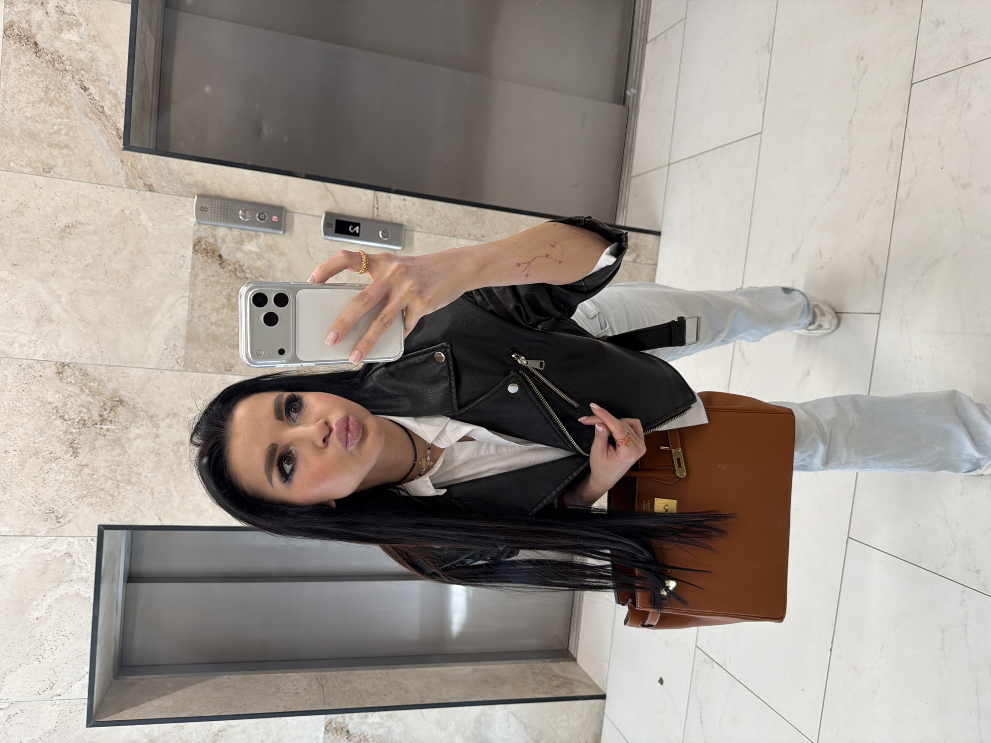 Woman Takes Multiple Selfies in Voronezh Building and Car