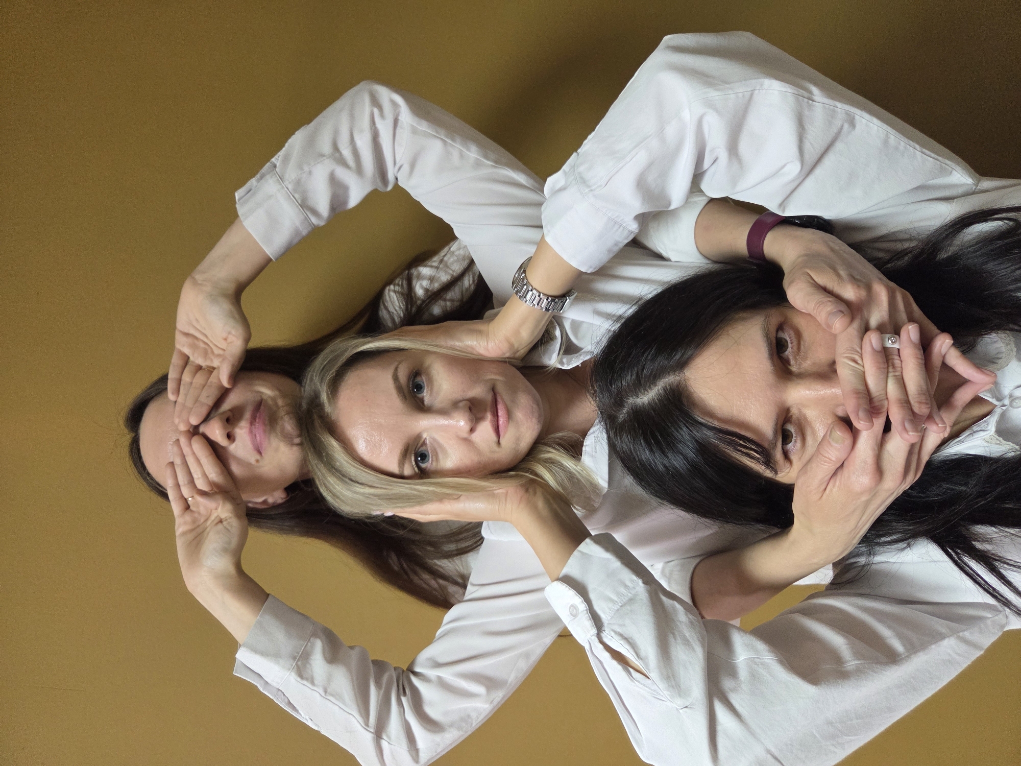 Artistic poses and hair braiding captured in coordinated location