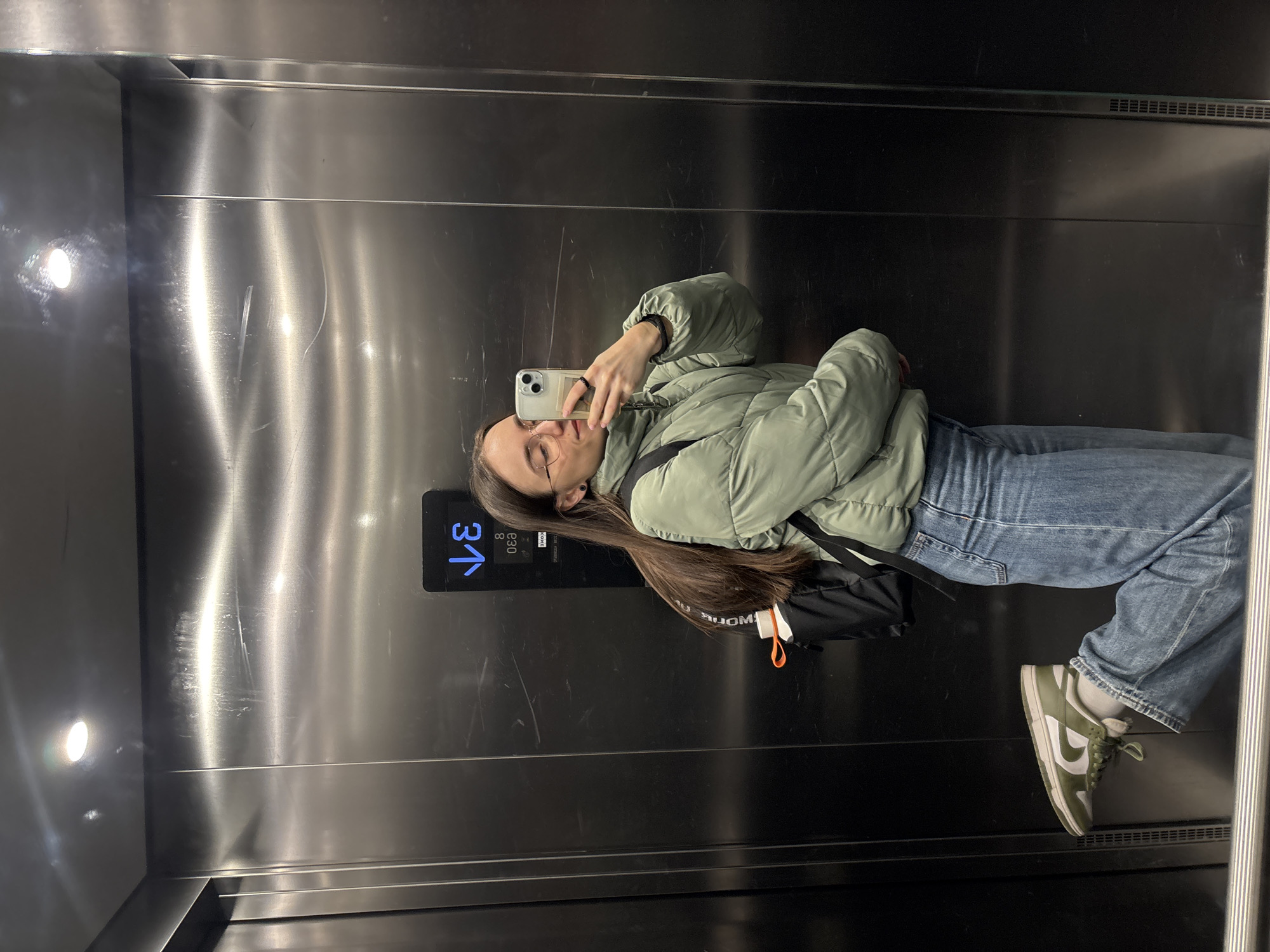 Woman Takes Elevator Selfie in Copenhagen Morning