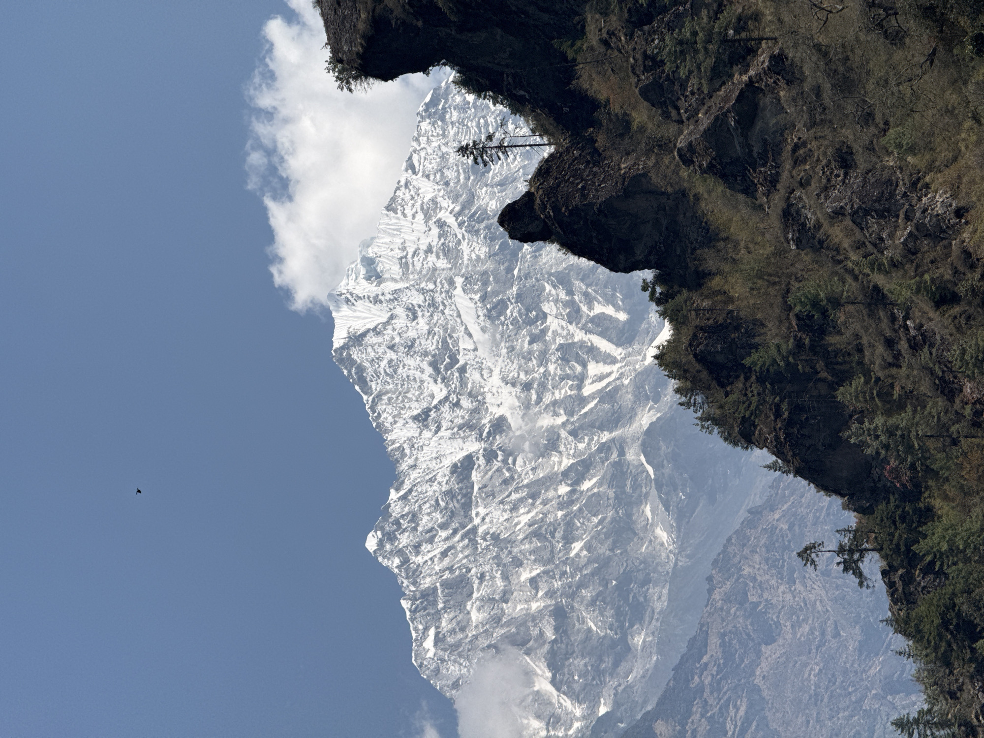 Snow-capped mountain peak documented in Nepal high-altitude landscape