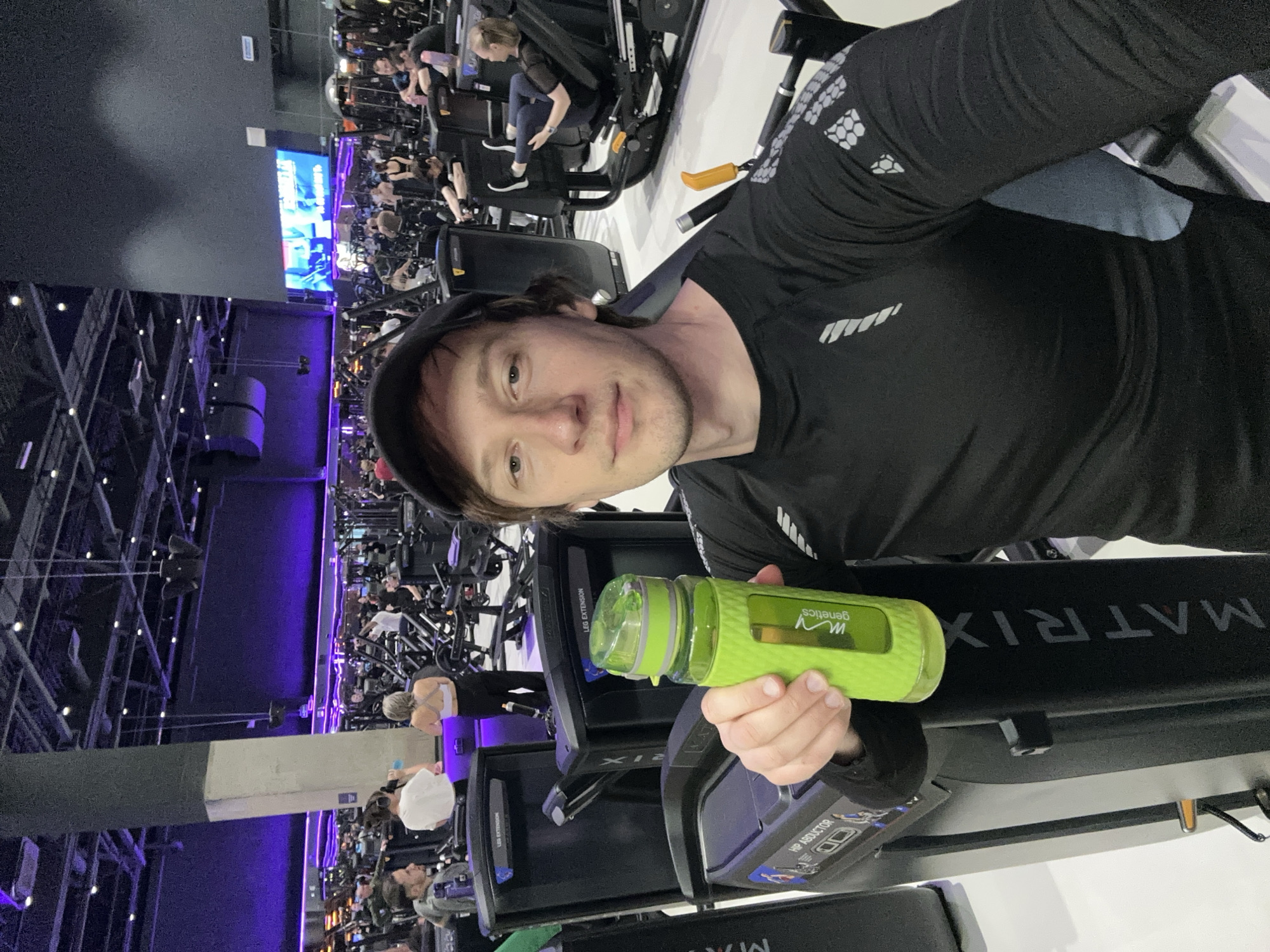 Person holds genetics bottle at Murino fitness center