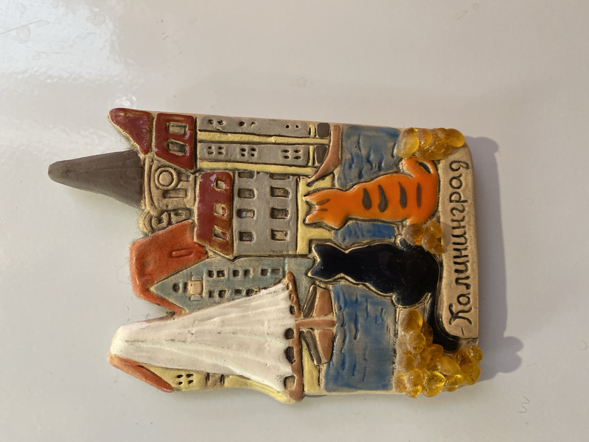 Souvenir collection and small decorative objects laid out for review