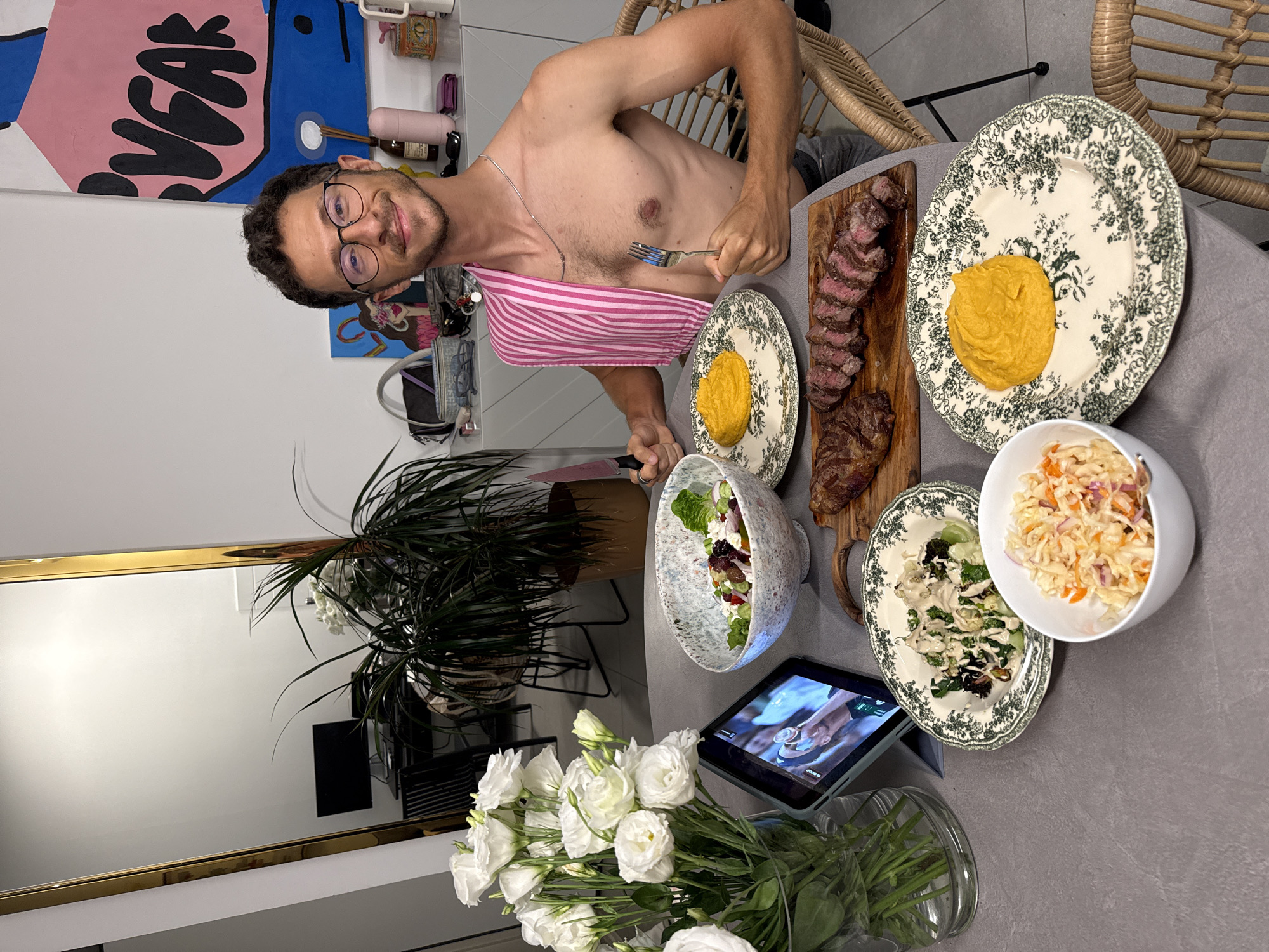 Man dines at restaurant table in Tel Aviv