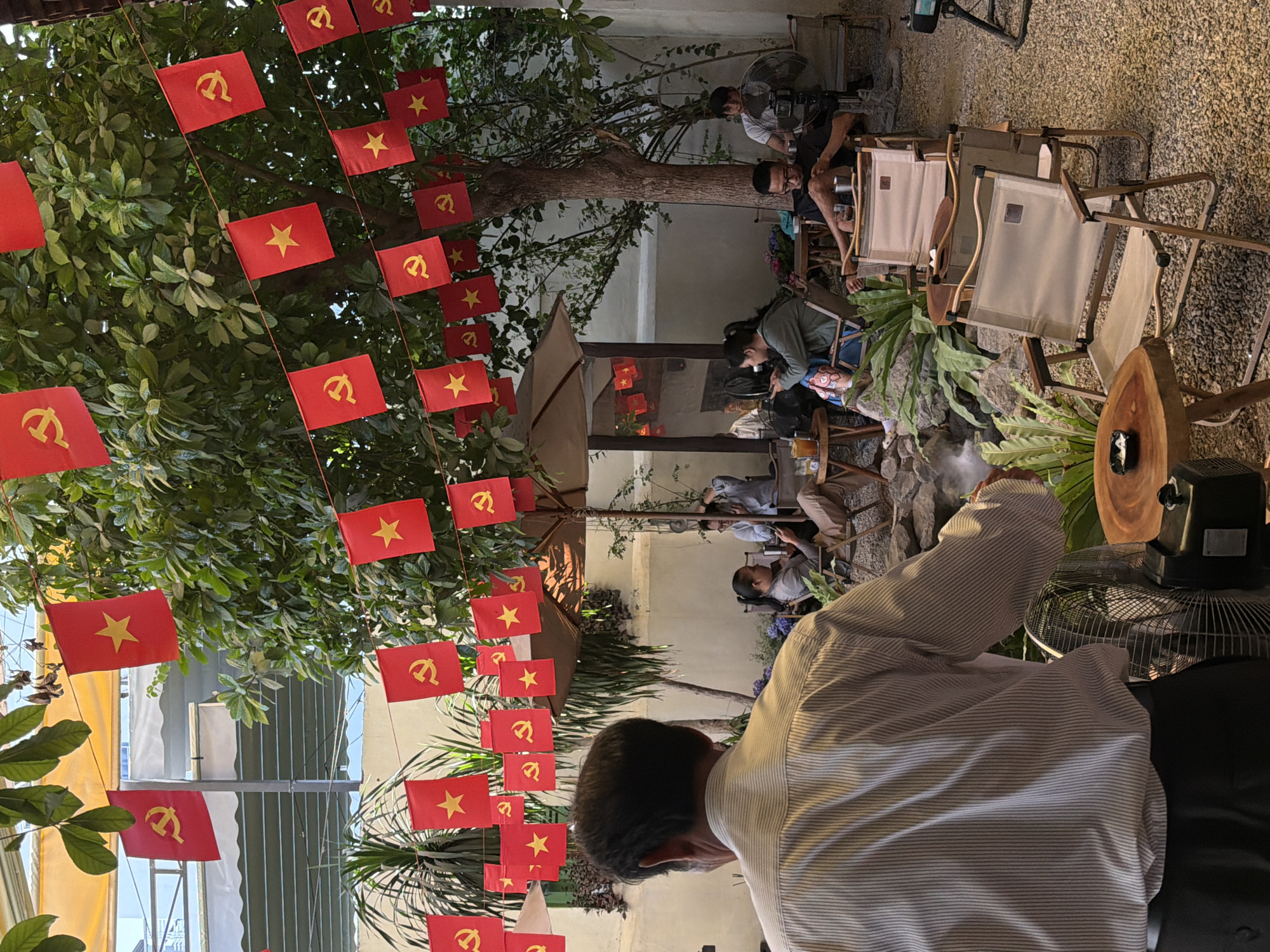 Flag-decorated Nha Trang streets during an early morning in June