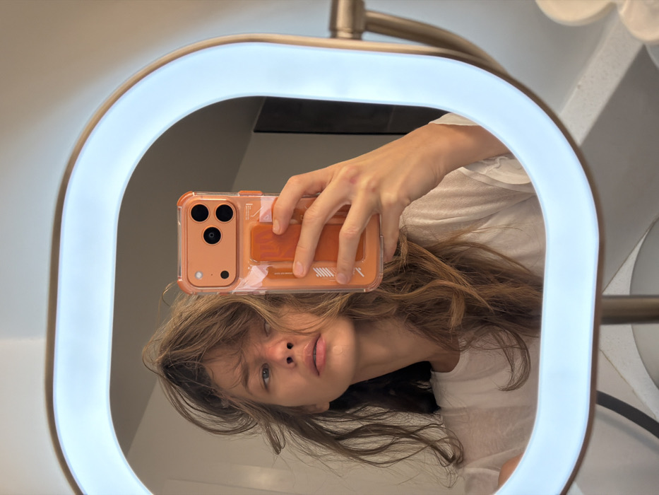 Woman takes mirror selfie in Fort Lauderdale early morning