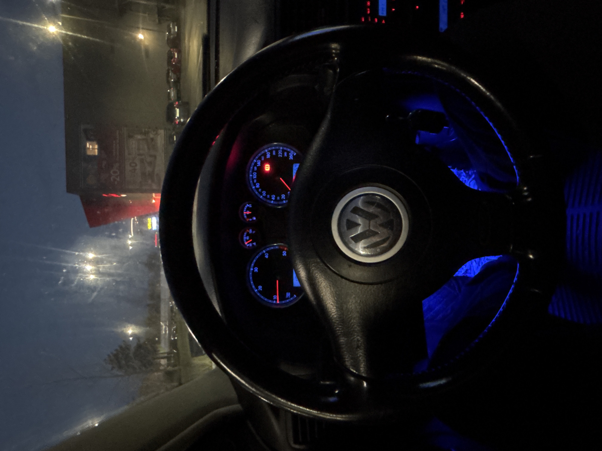 Evening routine documented in Burgas: driving, wet streets, cat