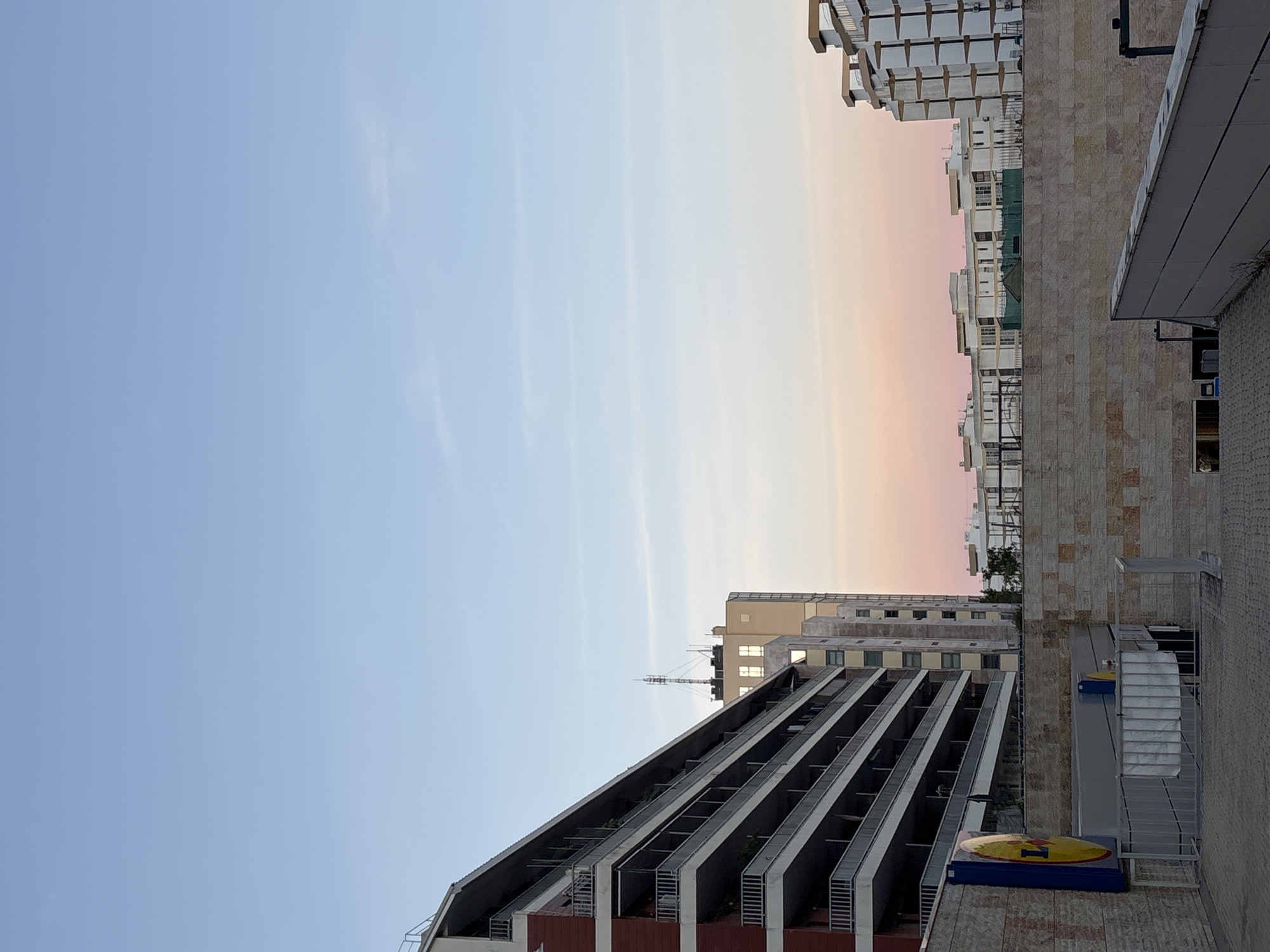Dusk cityscape photographed in Lisbon showing modern buildings against twilight sky